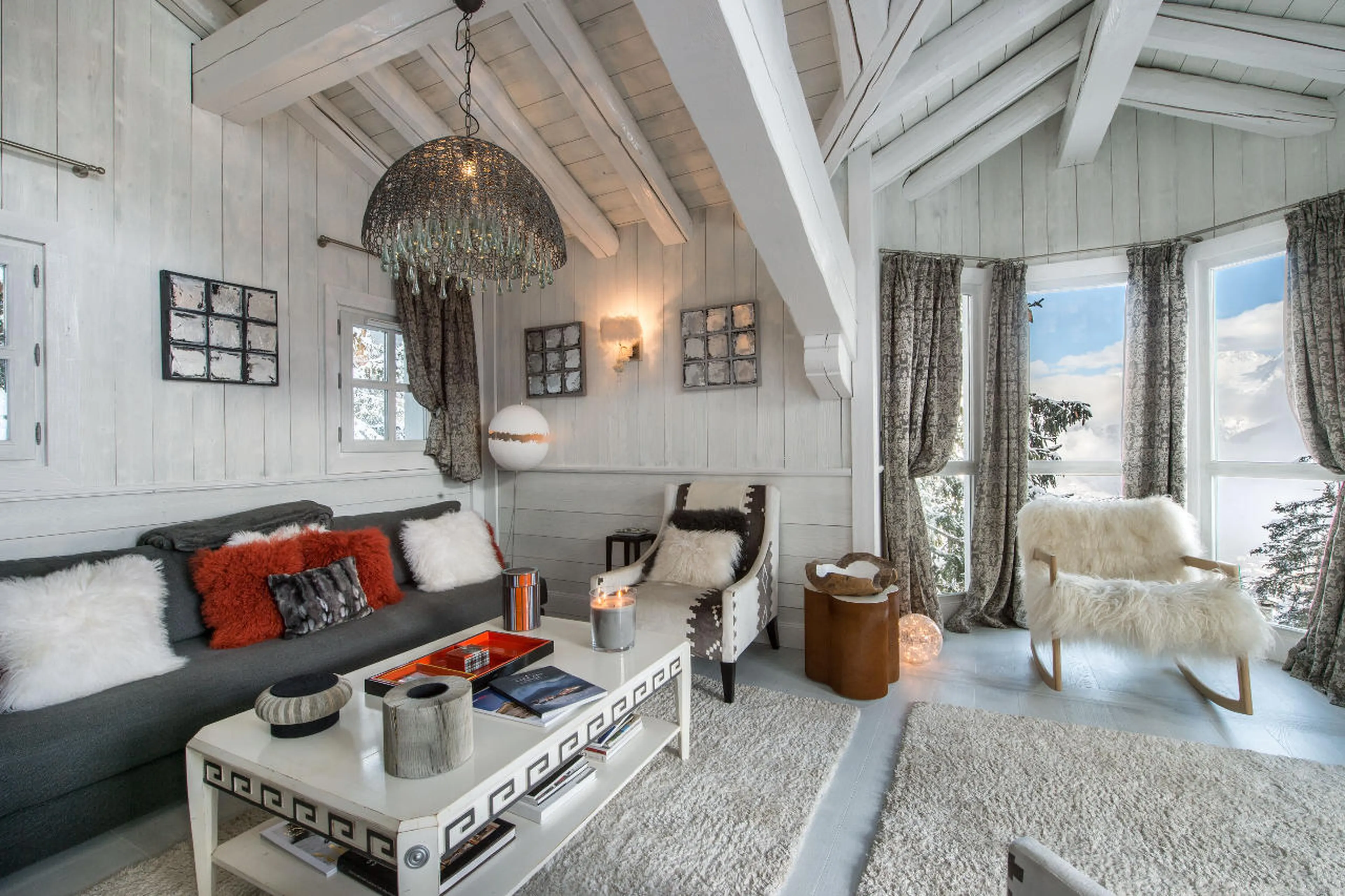 Living room with balcony access and superb views in Chalet White Dream in Courchevel 1850