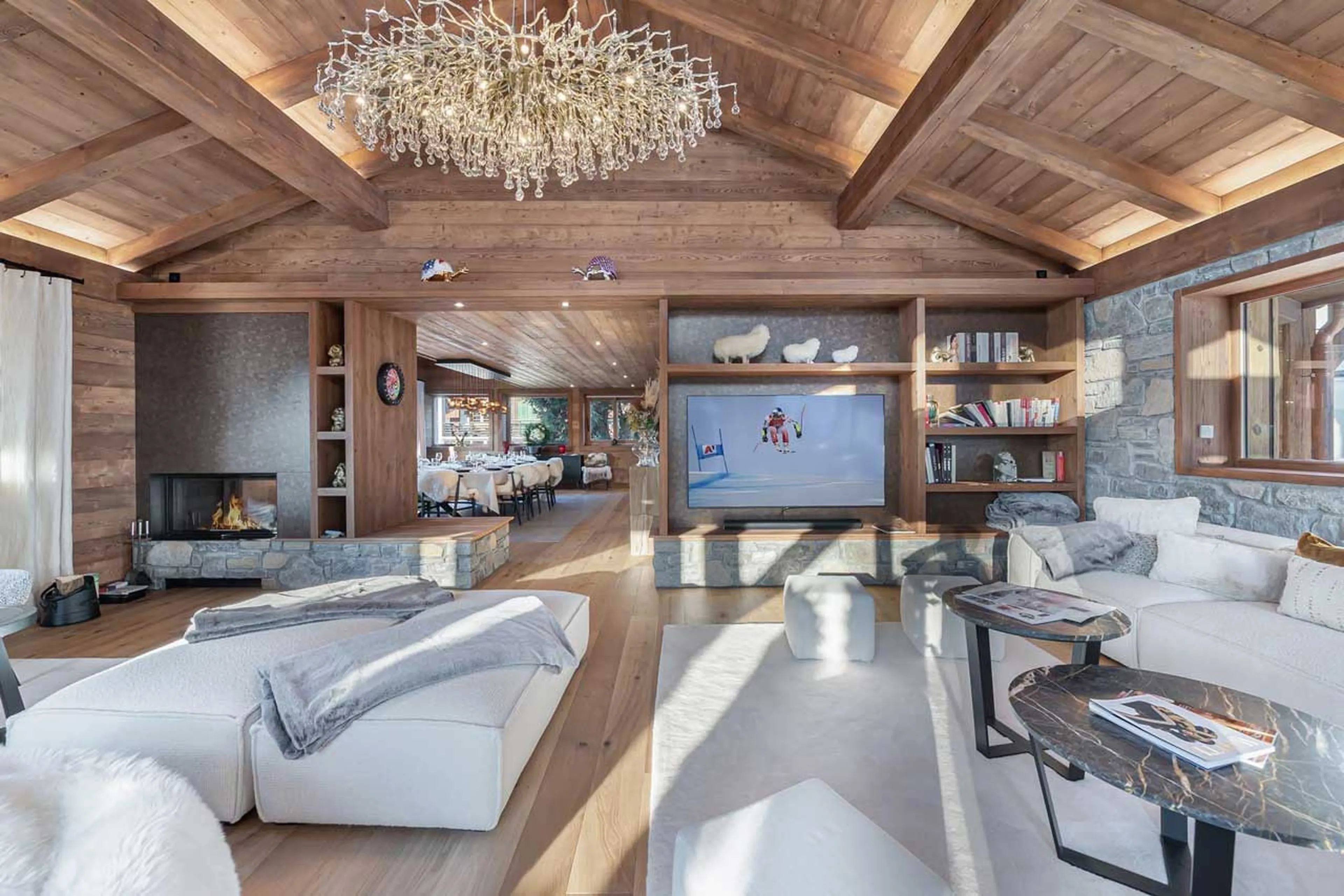 Fireplace in living area at Chalet Whymper in Megeve