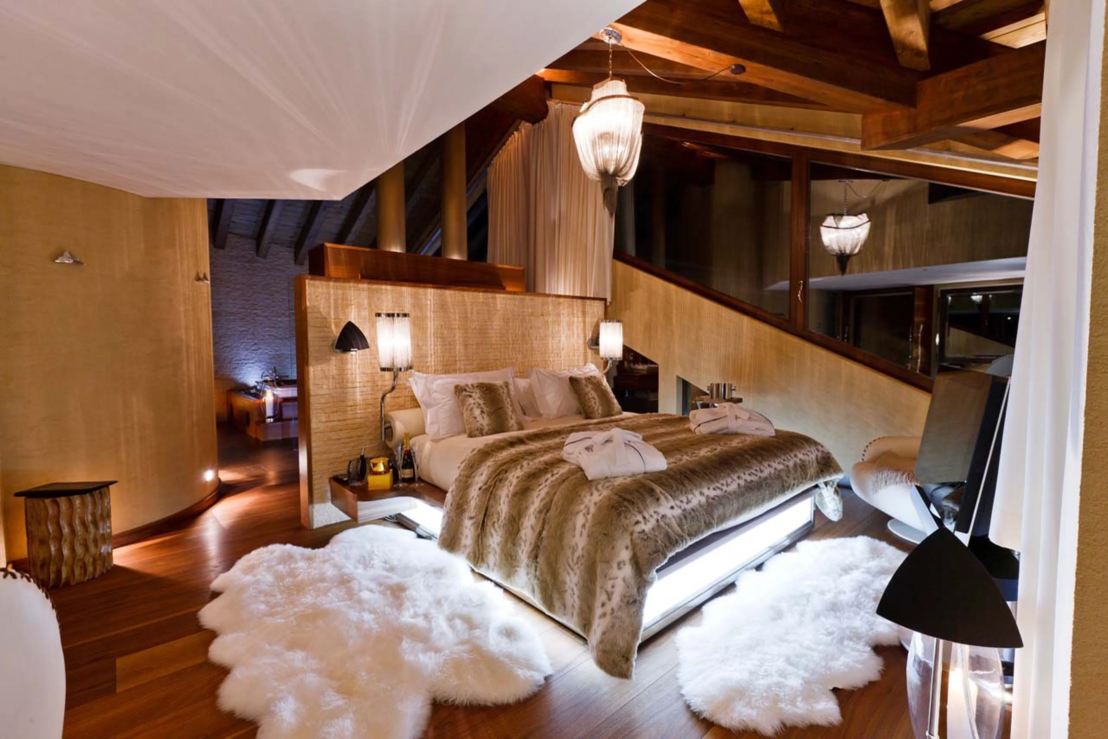 Designer furnishings in master bedroom of Chalet Zermatt Peak in Zermatt