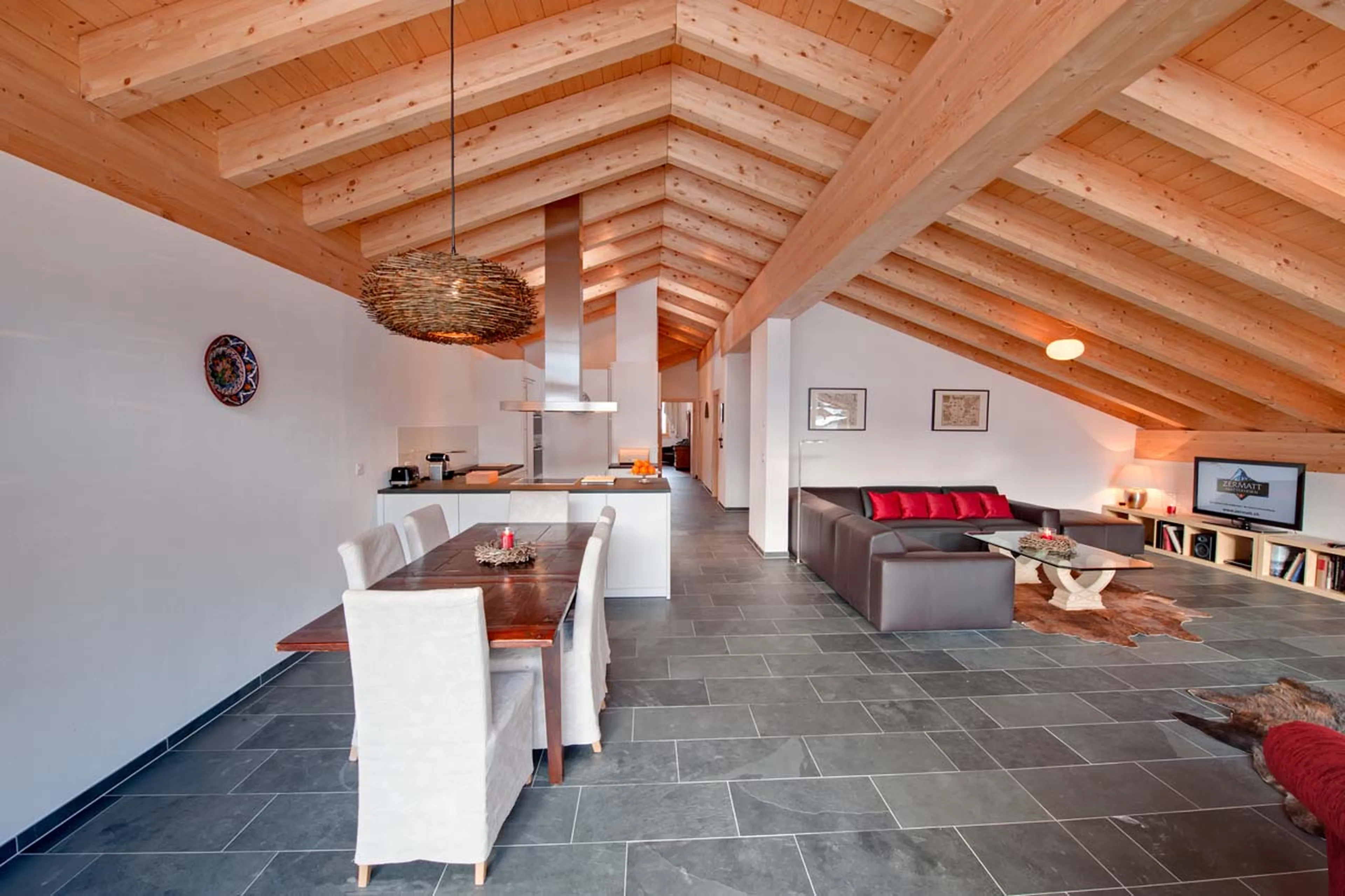 Open plan living area at Chalet Zeus in Zermatt