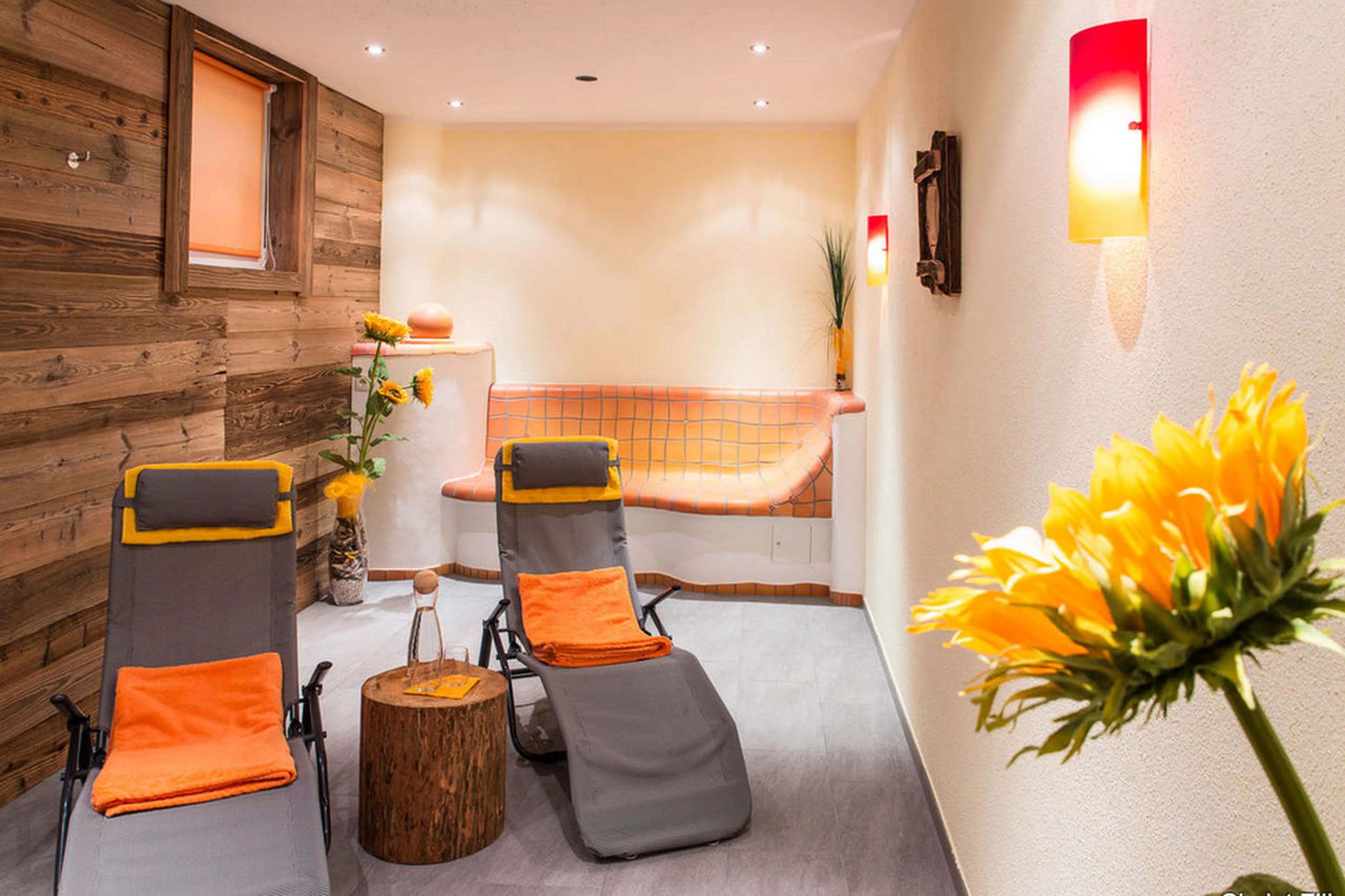 Wellness area with relaxation room and heated mosaic bed in Chalet Ziller in Zillertal