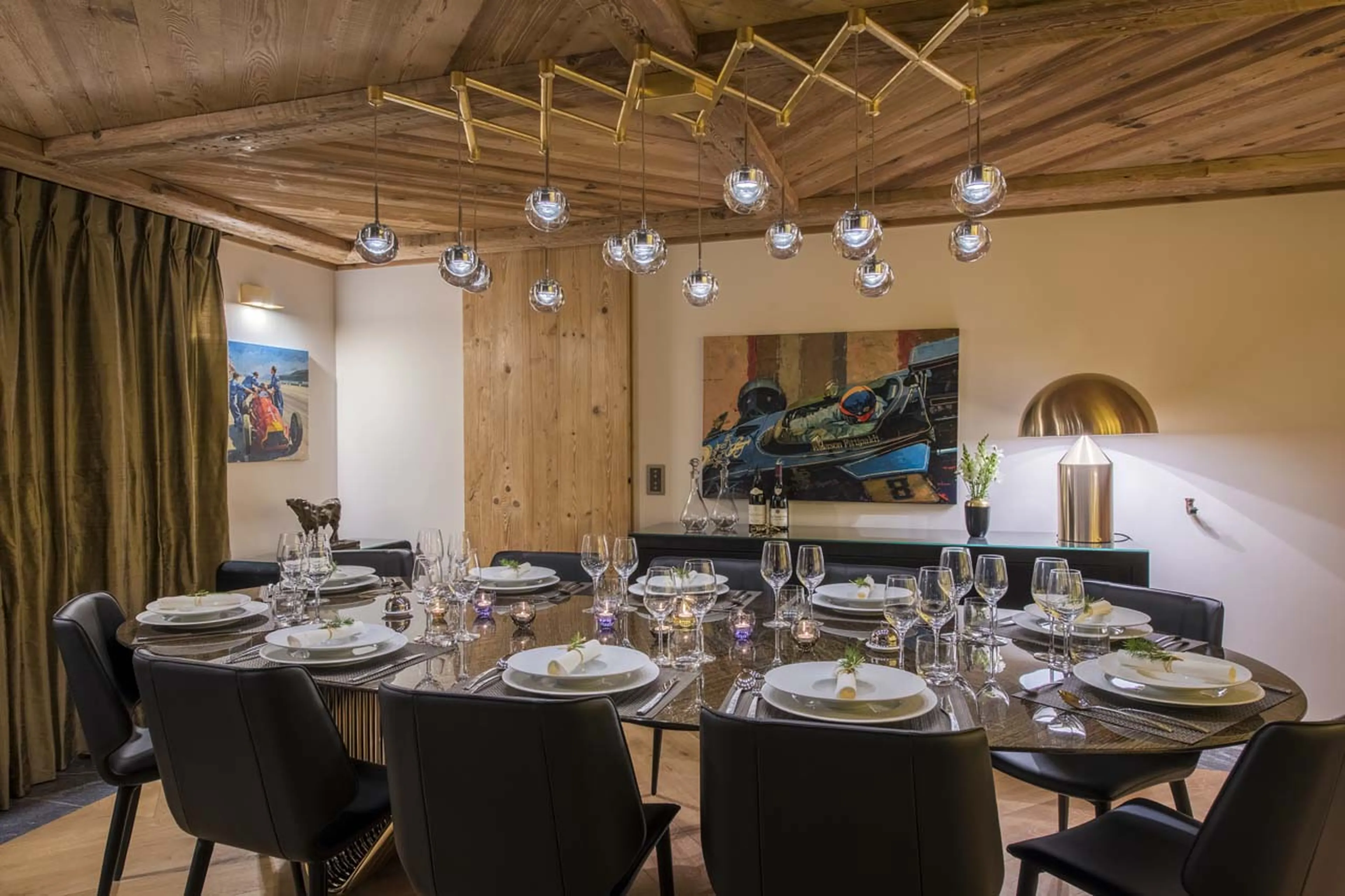 Dining room at night at Chesa El Toula in St Moritz