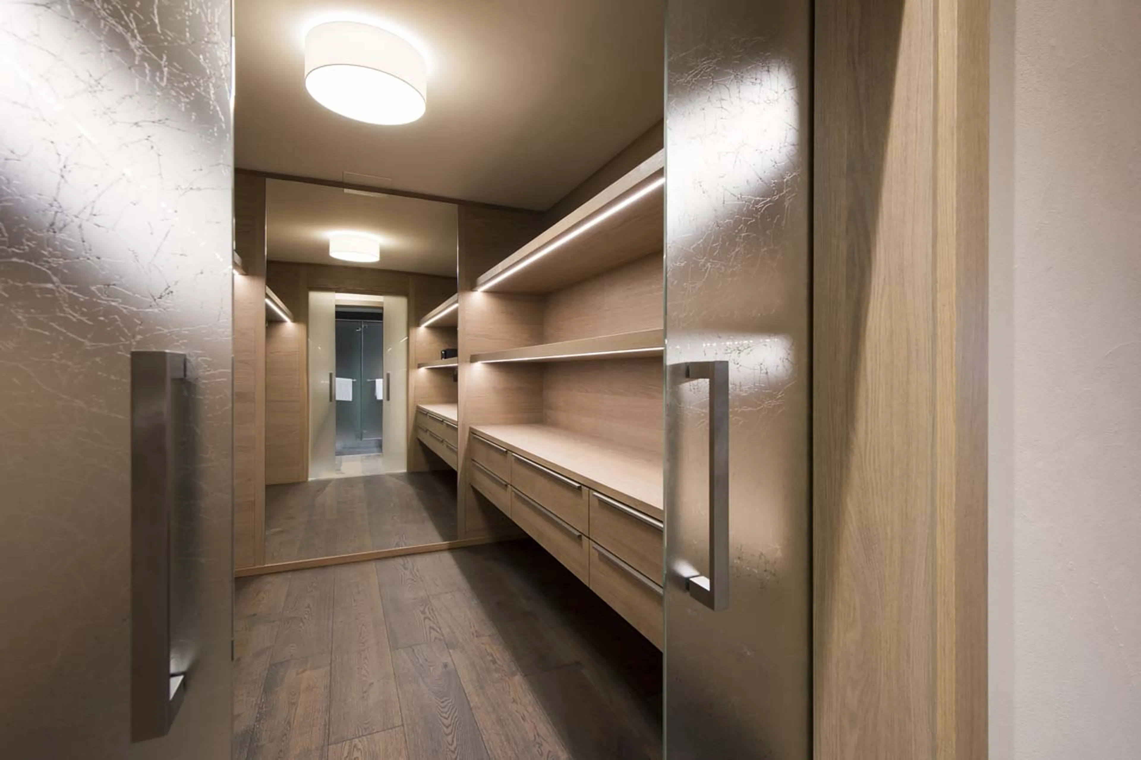 Walk-in wardrobe in master suite of Christiania Penthouse in Zermatt
