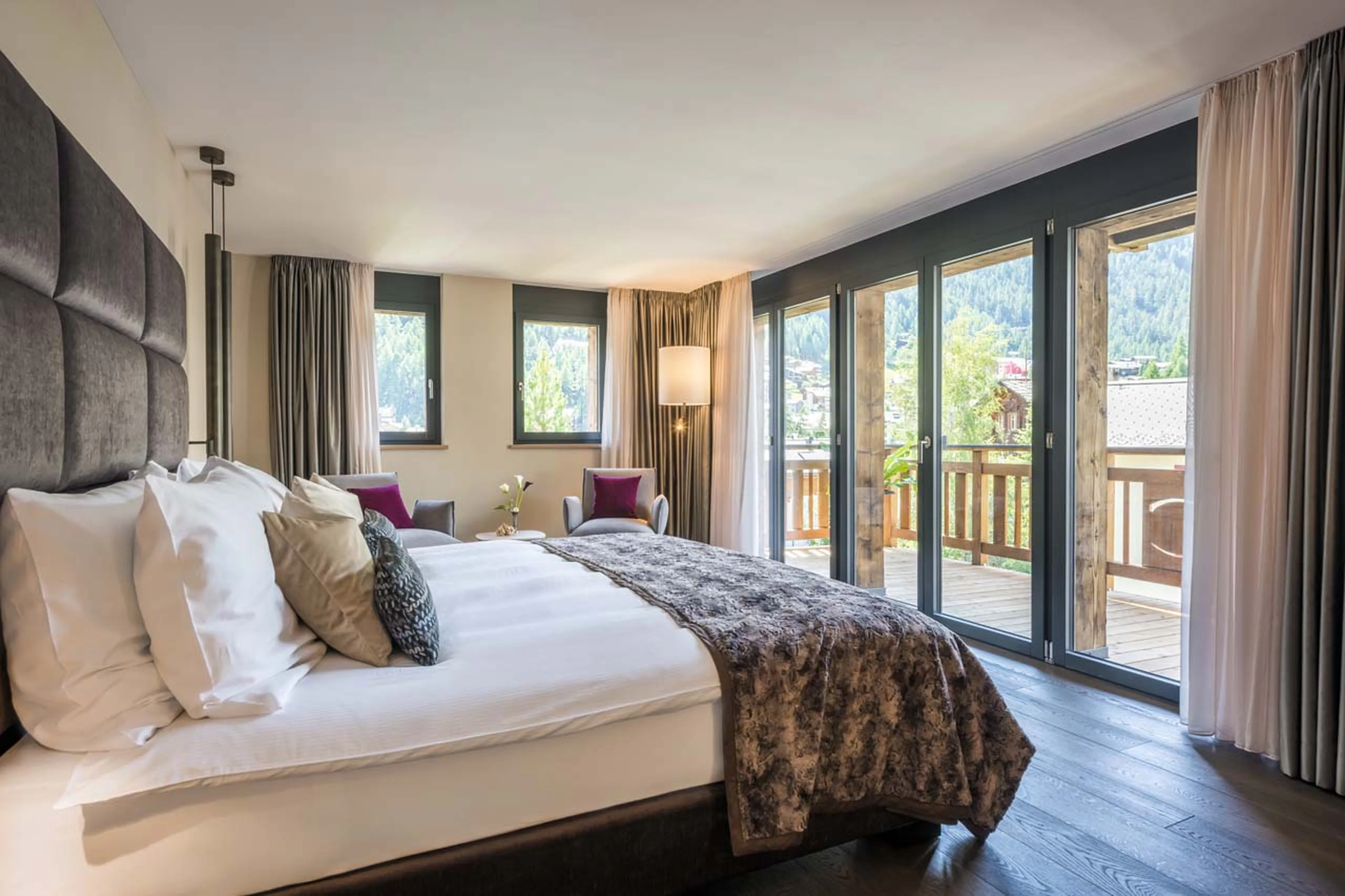 Terrace access from bedroom six at Christiania Penthouse in Zermatt