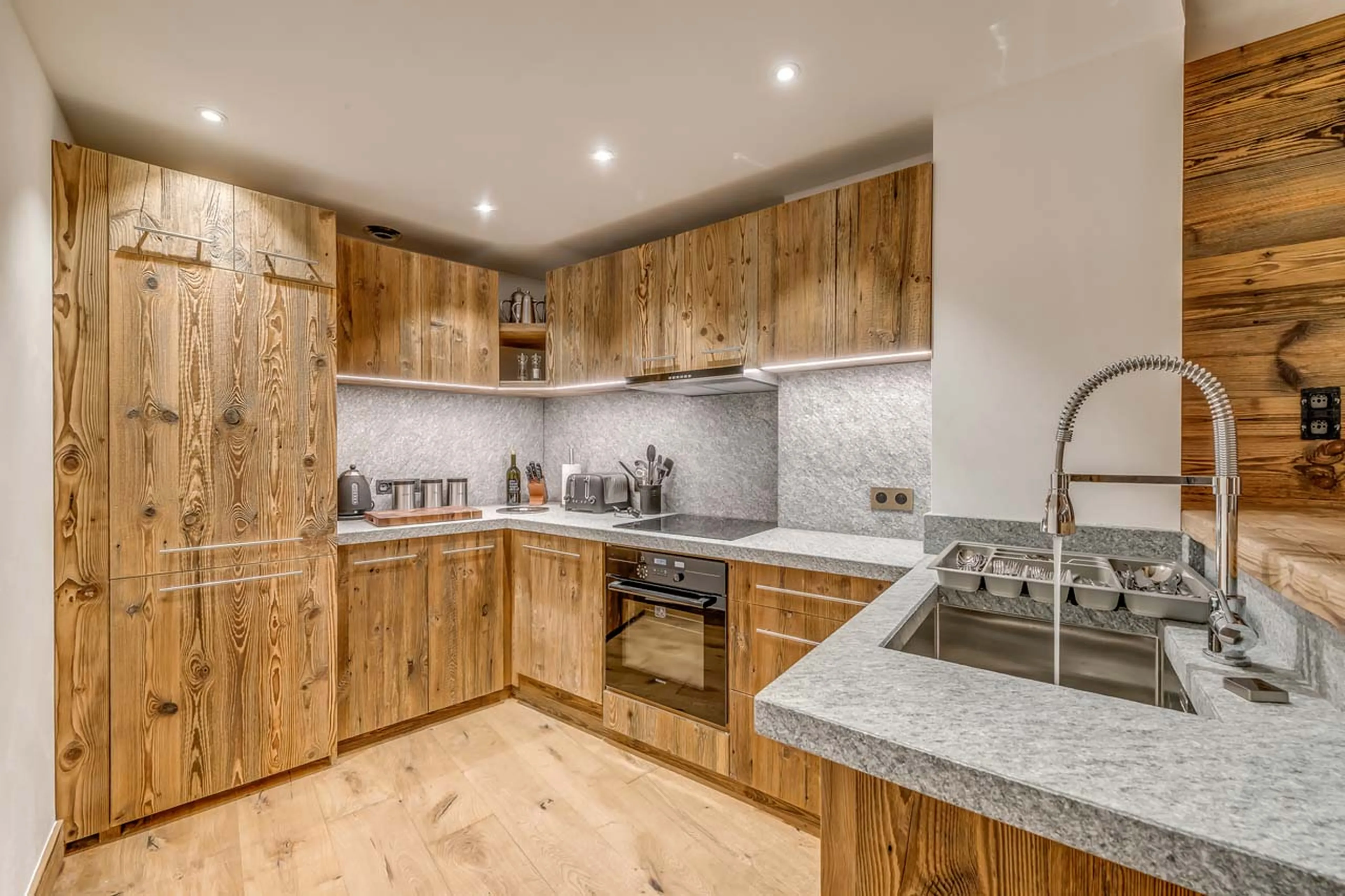 Separate kitchen at Etoile Filante in Val d'Isere