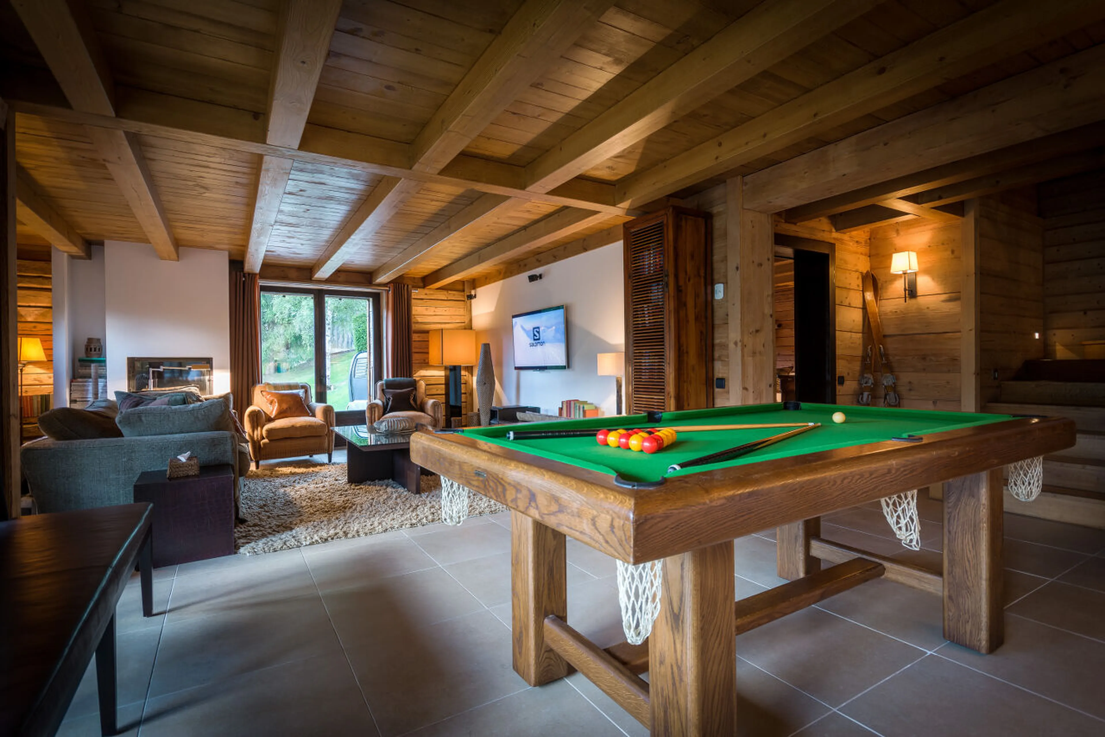 Games and billiard table in entertainment area of Ferme de Moudon in Les Gets