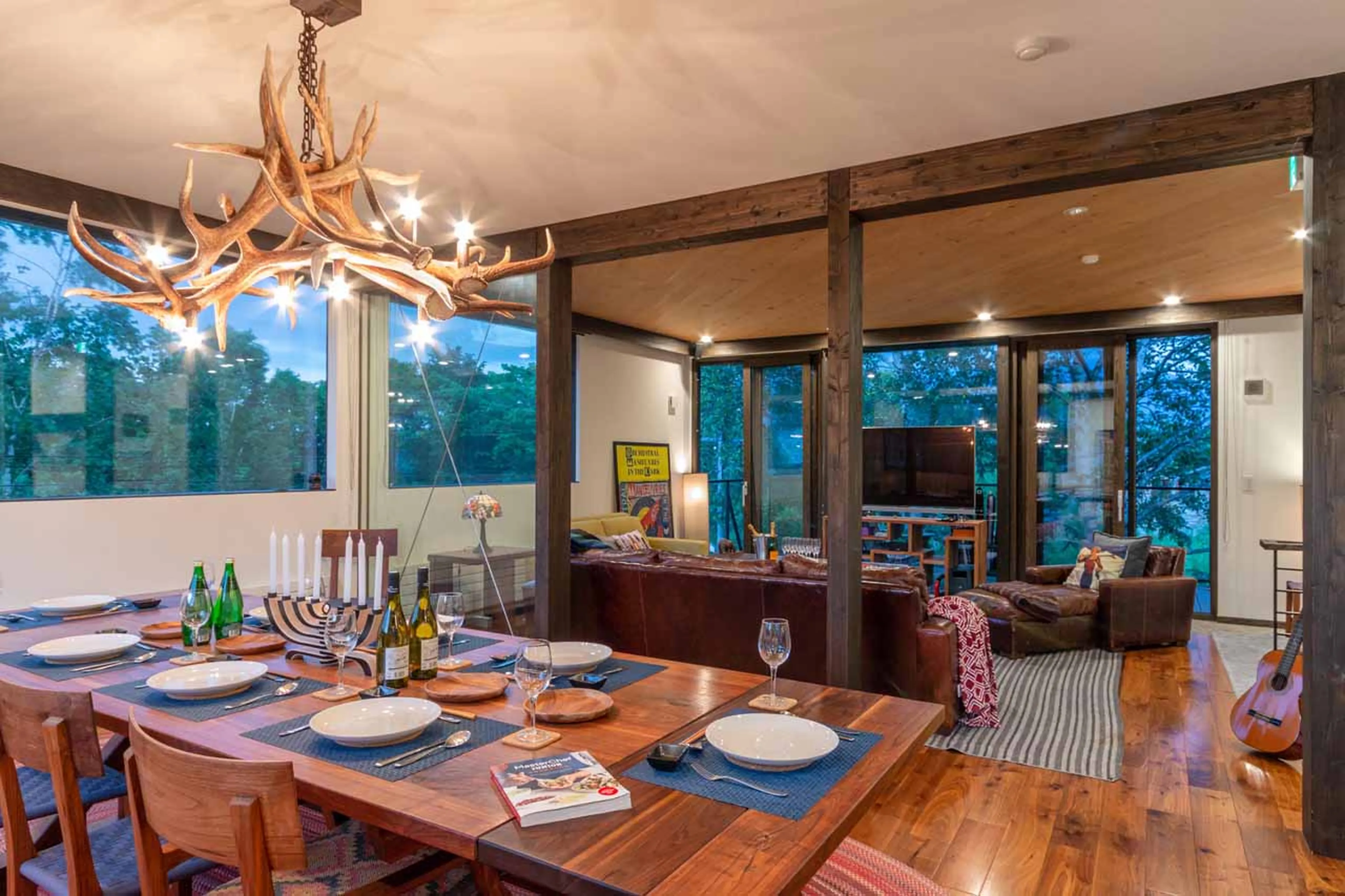 Dining room and living area at Gustav's Hideaway in Niseko