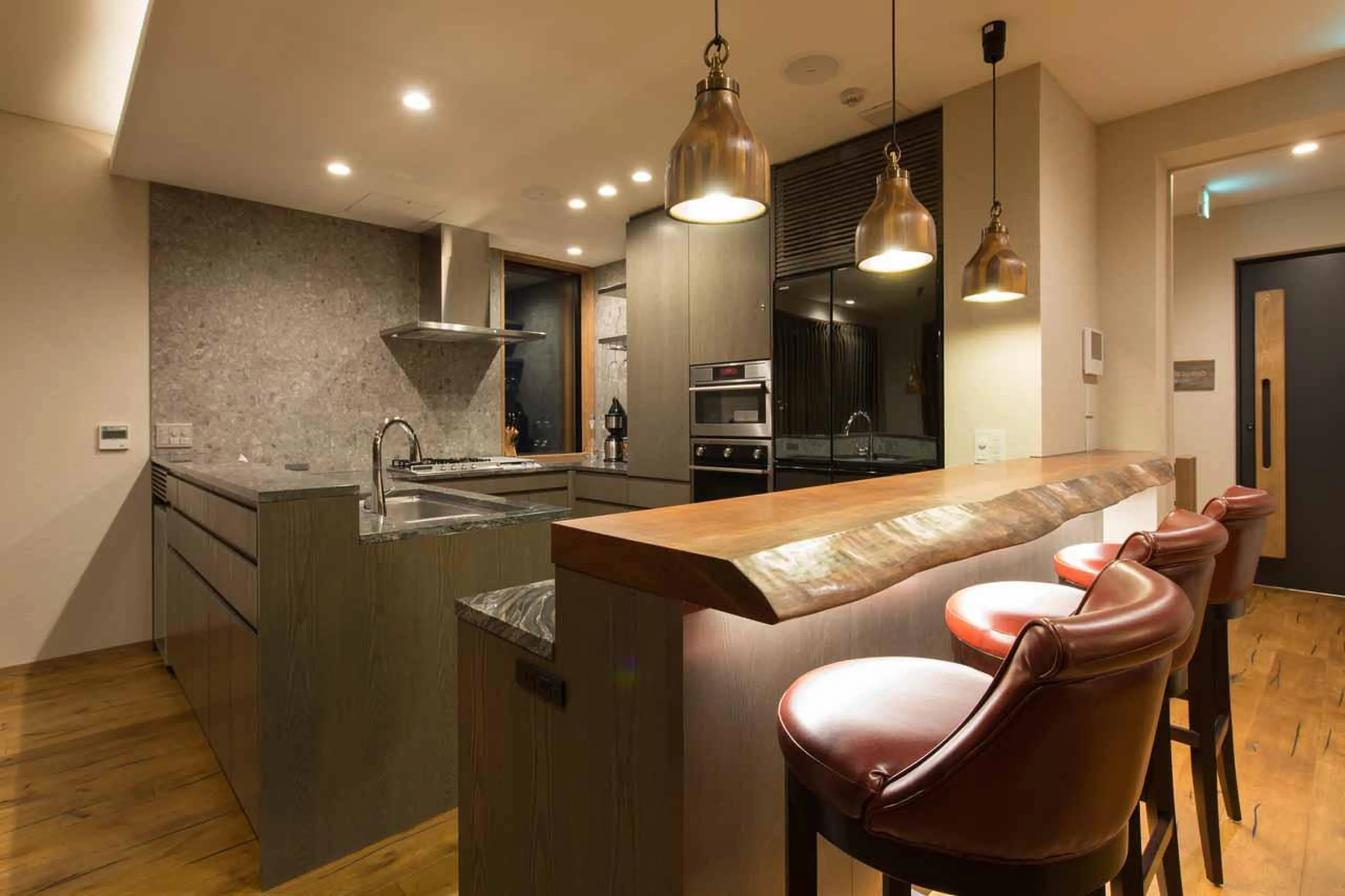 Kitchen with high seating in Hakuchozan in Niseko