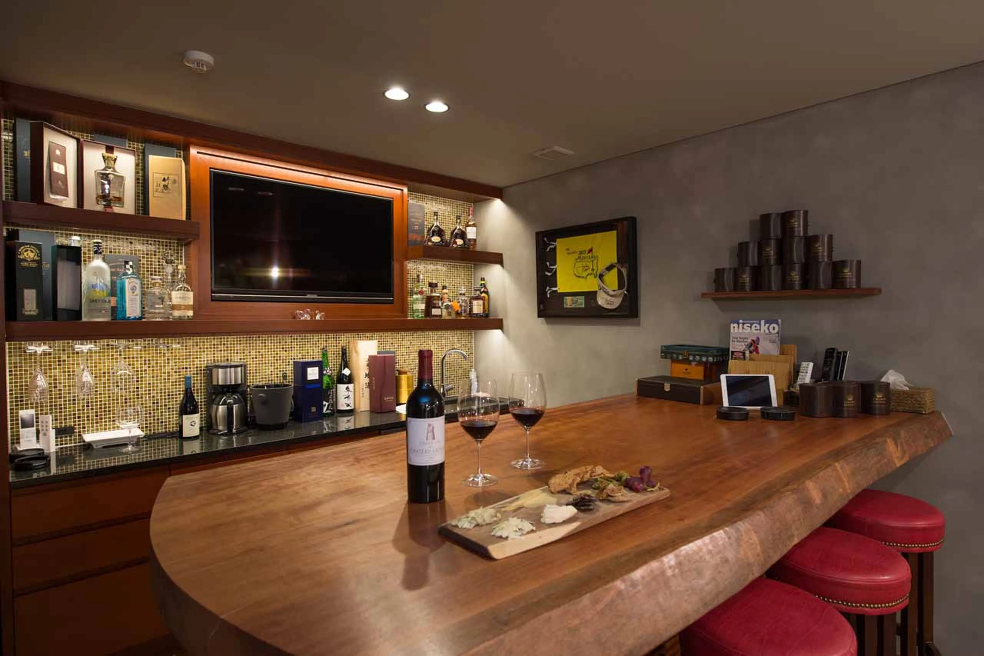 Well-stocked bar at Hakuchozan in Niseko