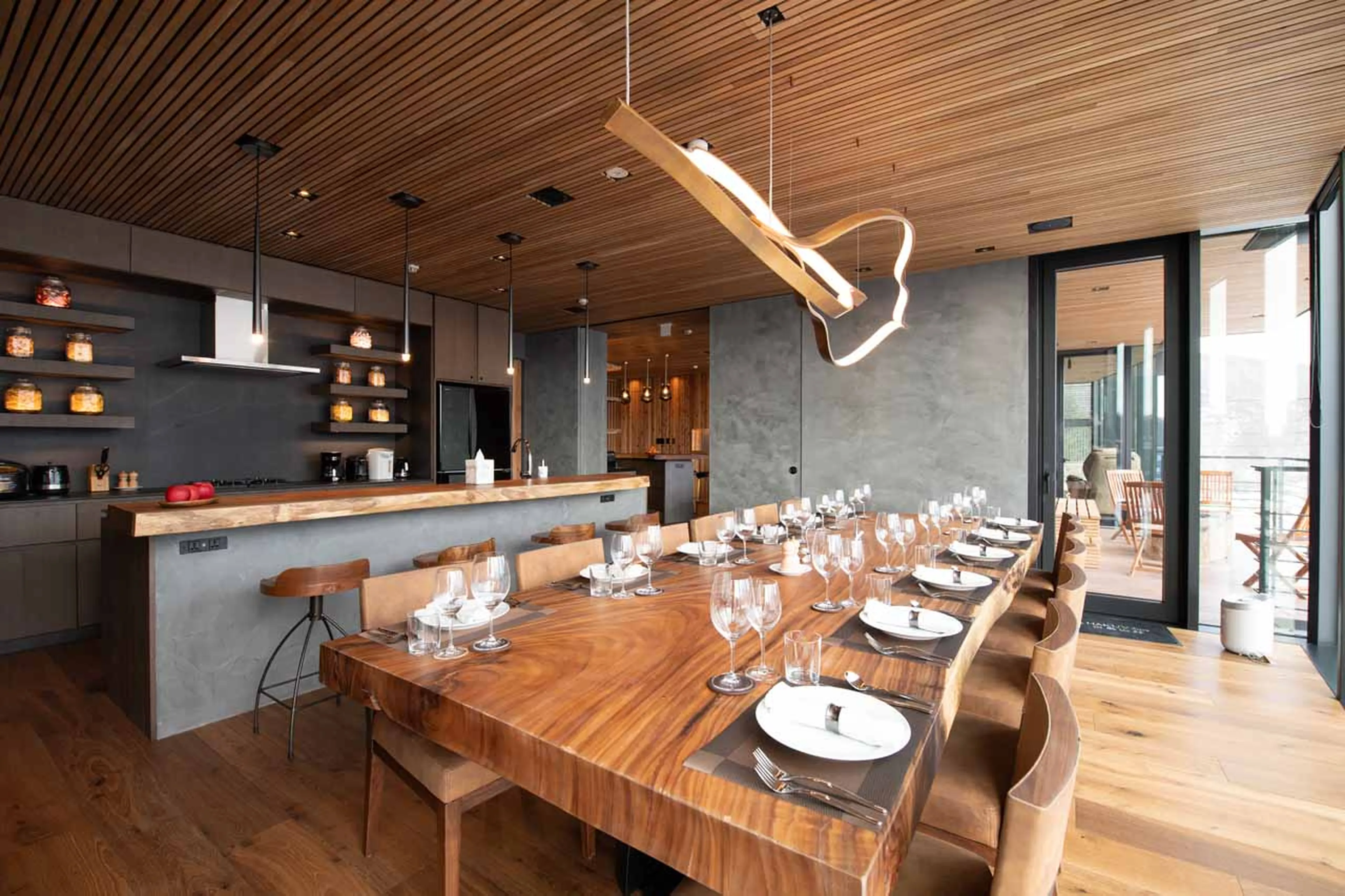 Dining room and kitchen at HakuVillas in Niseko