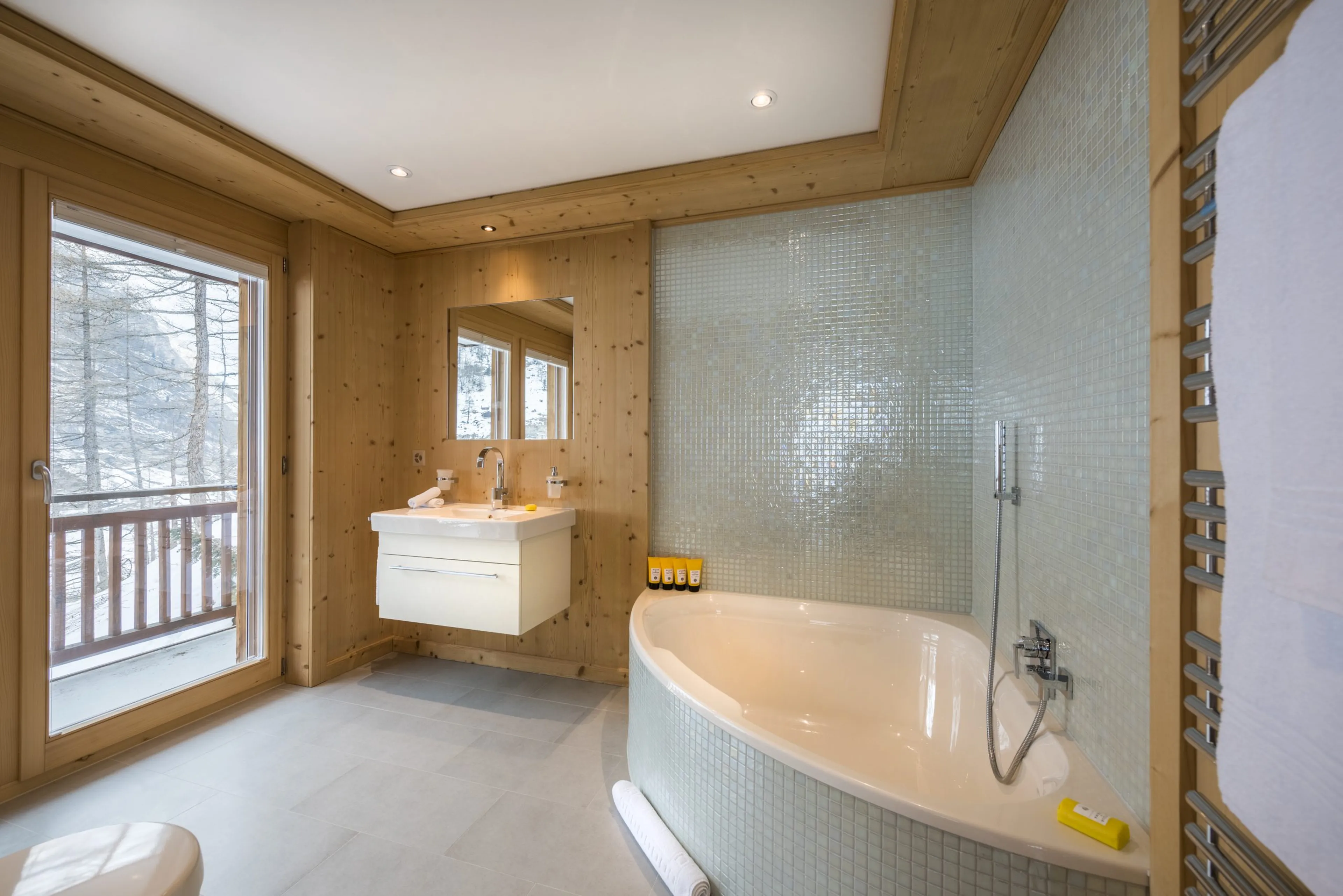 Bathroom two with balcony at Haus Leytron in Zermatt