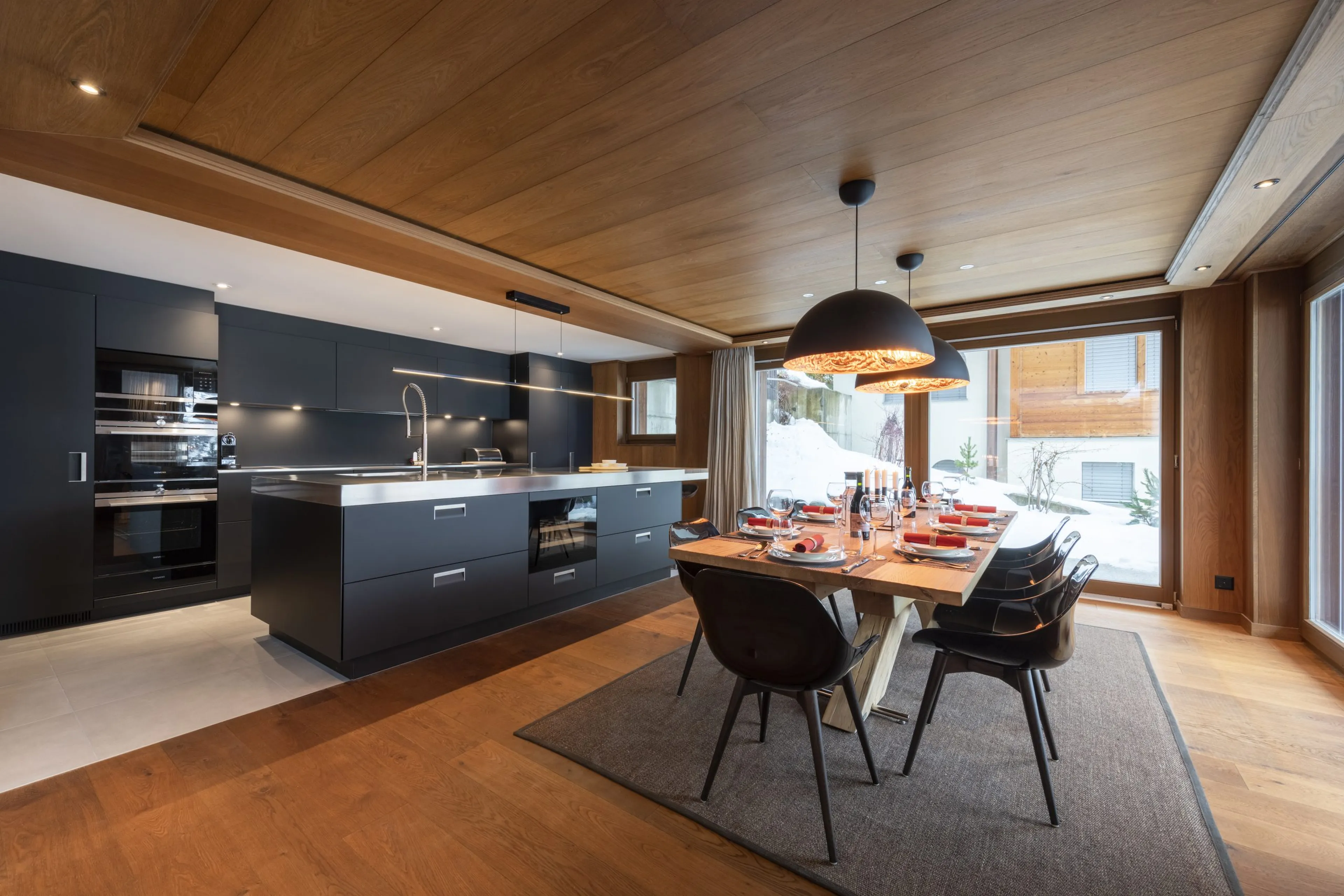 Dining area and kitchen at Haus Leytron in Zermatt