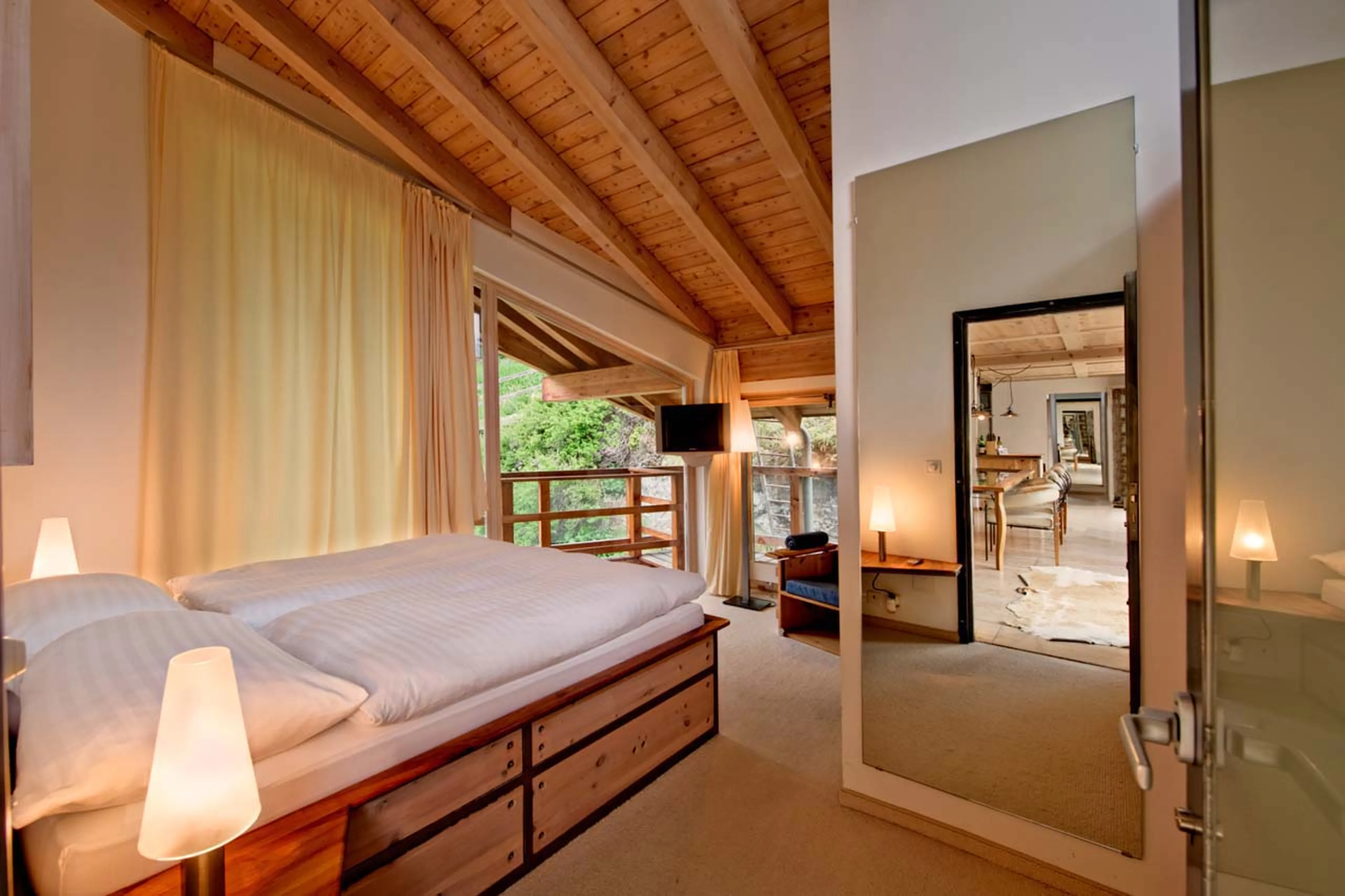 Bedroom two at Heinz Julen Penthouse in Zermatt