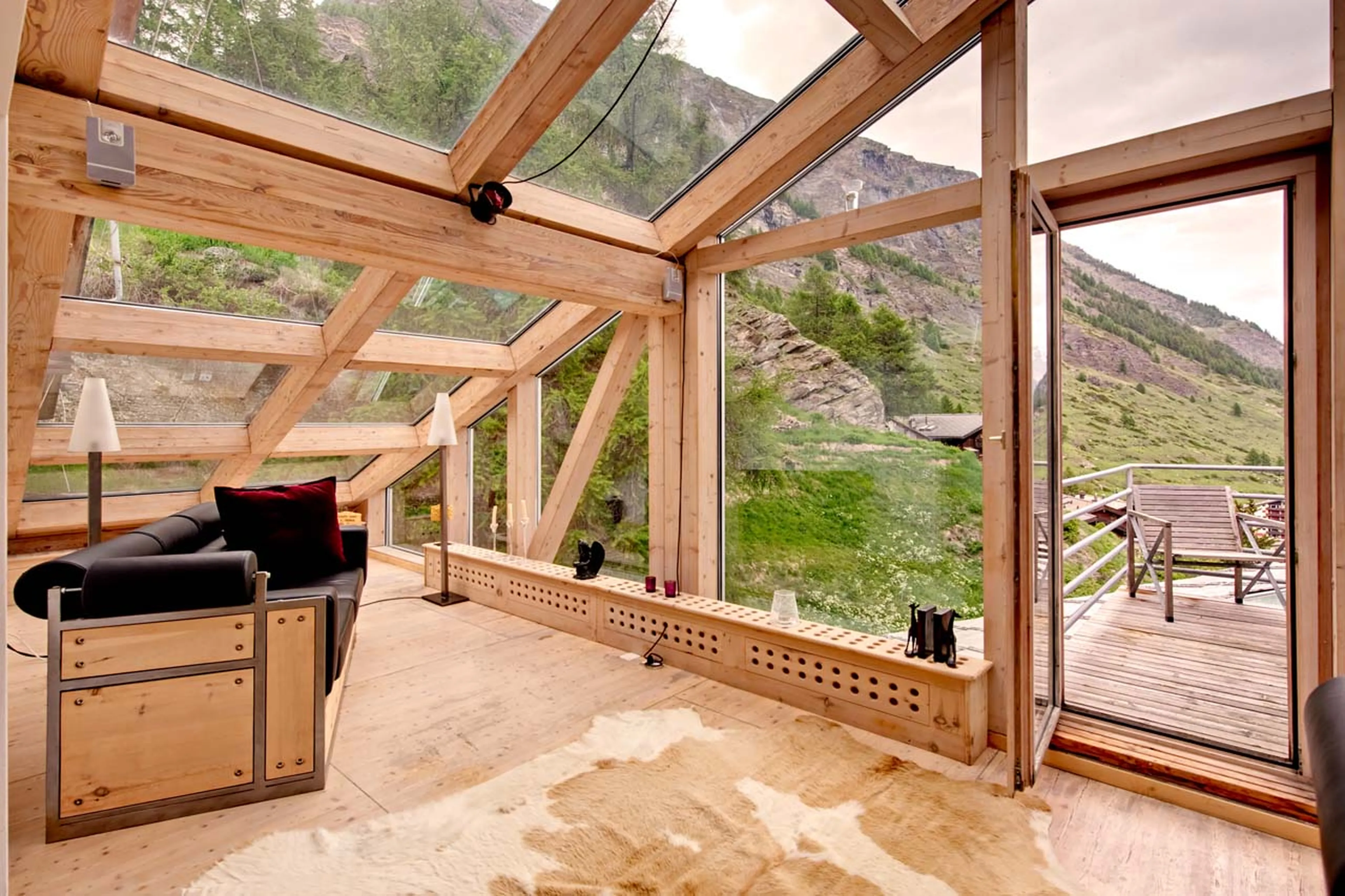 Balcony access from living area of Heinz Julen Penthouse in Zermatt
