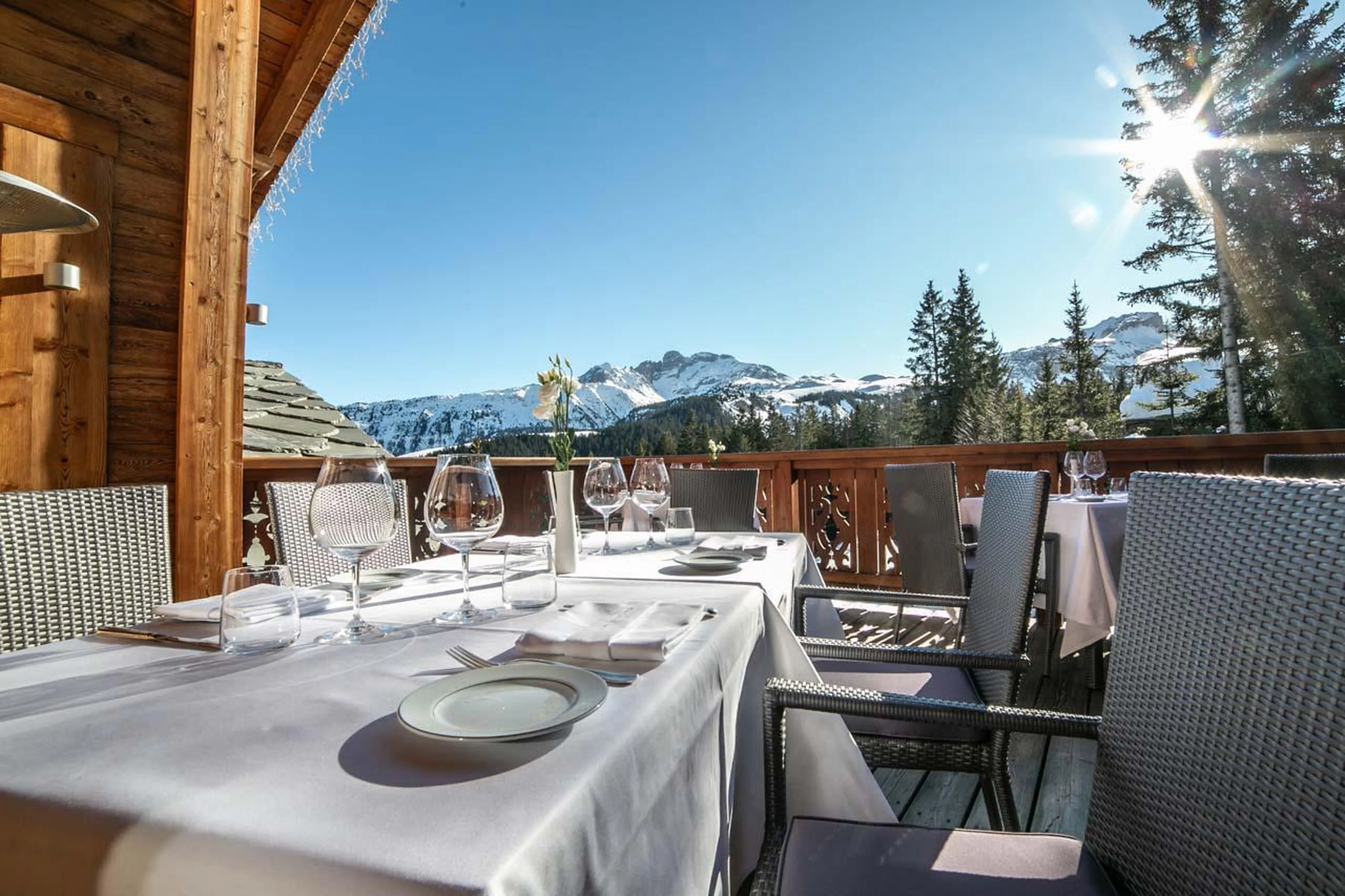 Outdoor seating at Baumanière 1850 restaurant at Apartment Signal in Courchevel 1850