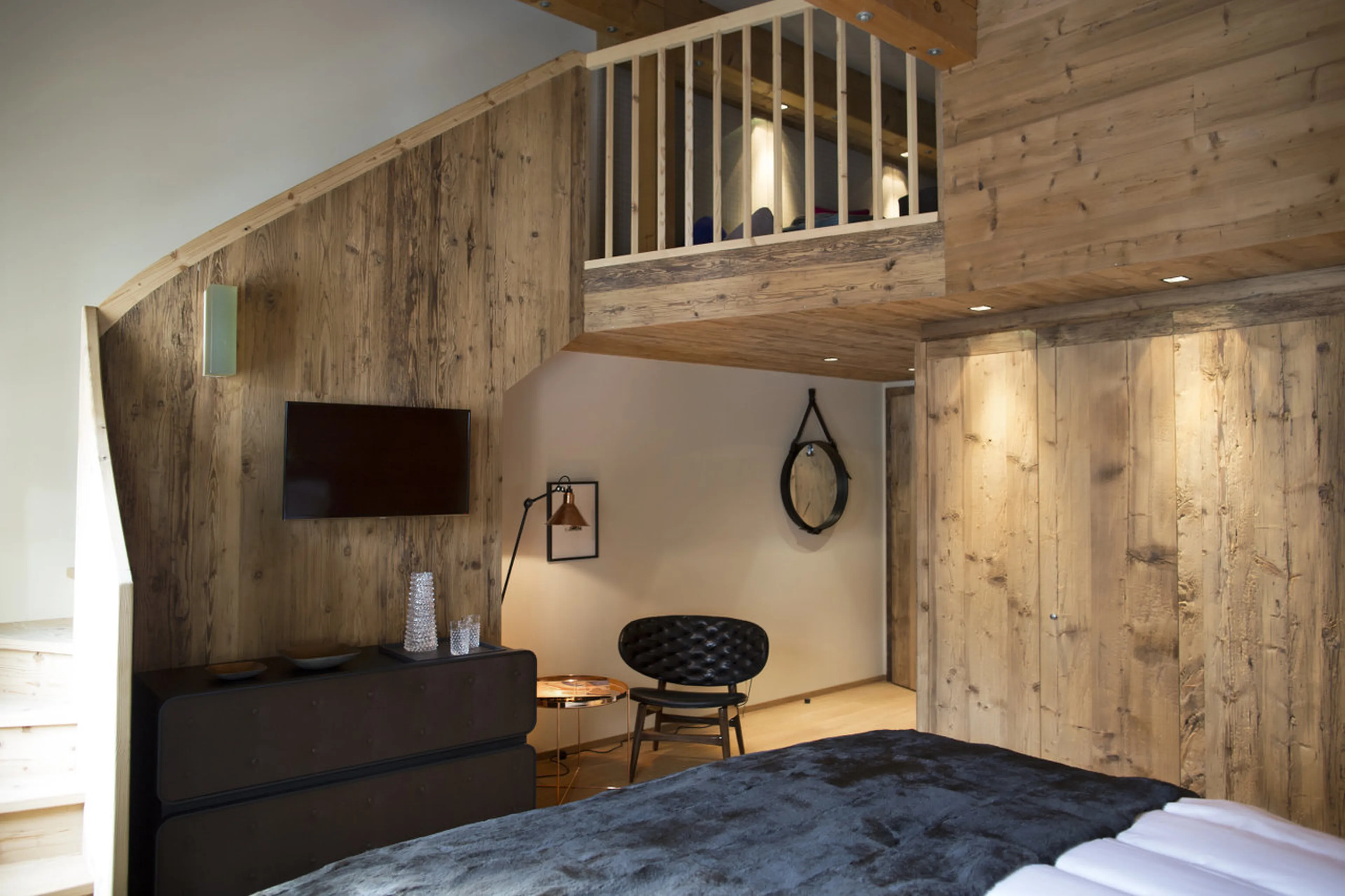 Staircase to gallery with two additional beds in House Hannes Schneider in Stuben, near Zürs