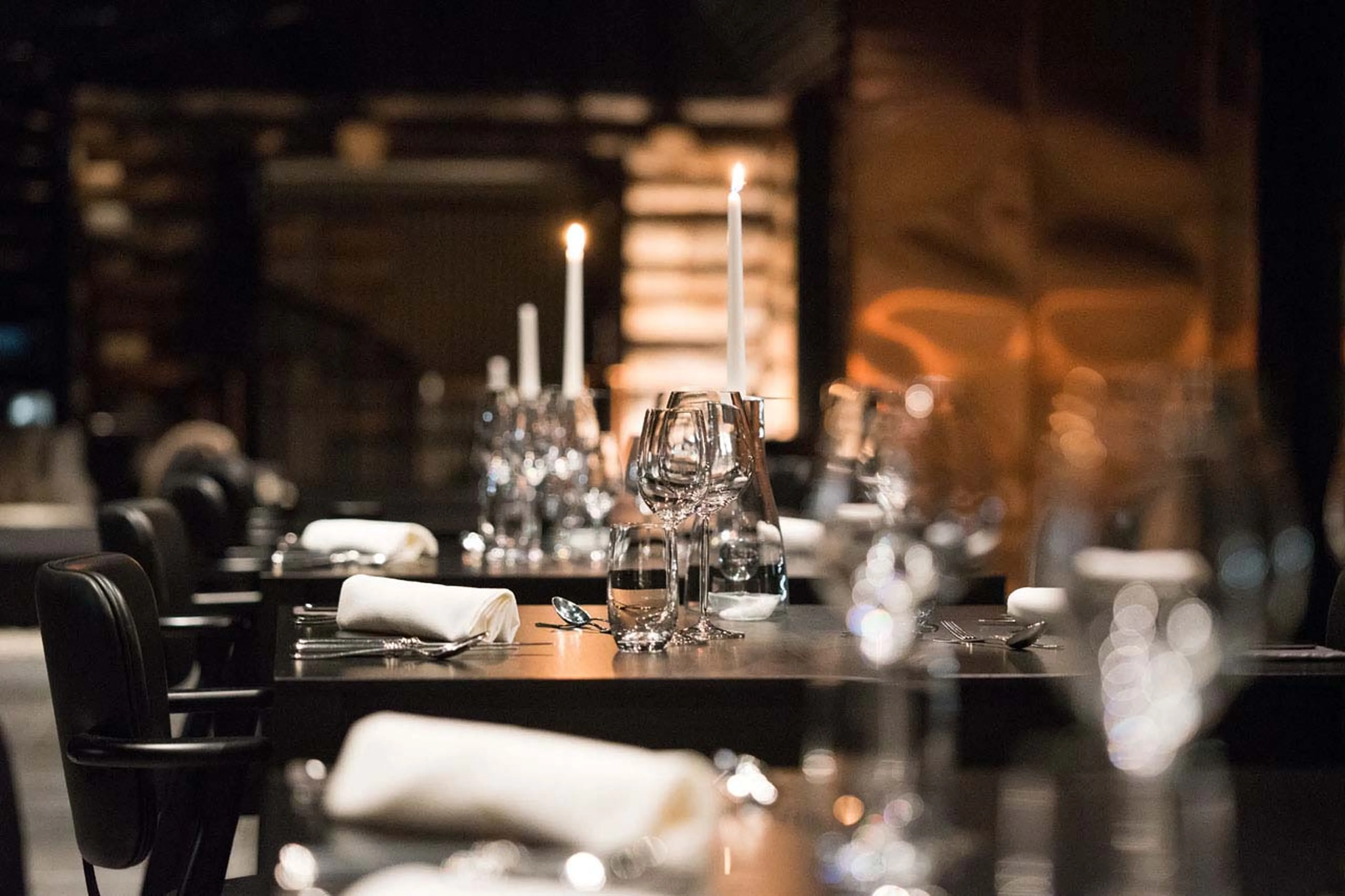Candlelit dining table at Javri Lodge in Finland