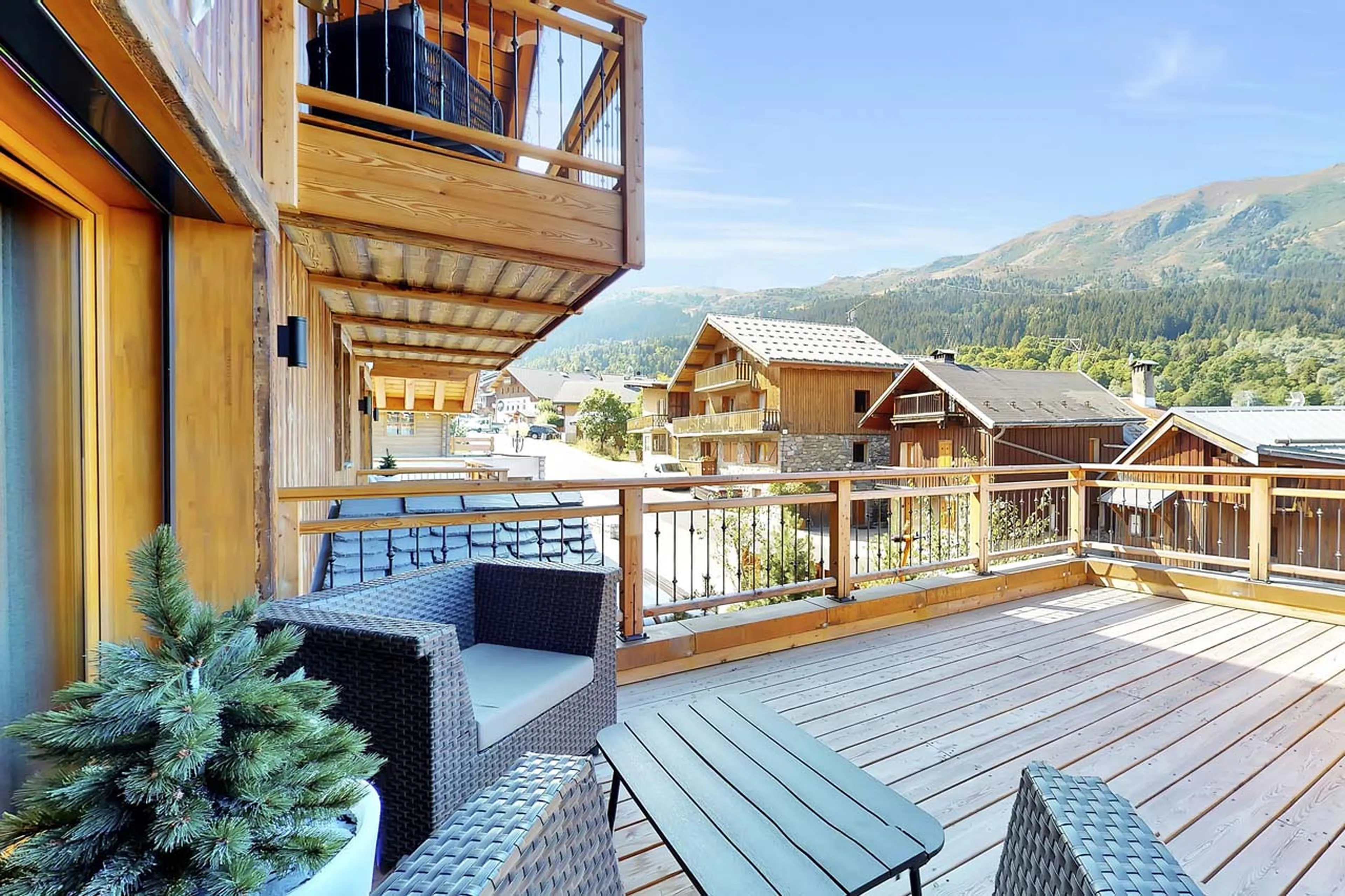 Access to west-facing balcony from bedroom three at La Ferme de Mon Grand Pere in Meribel