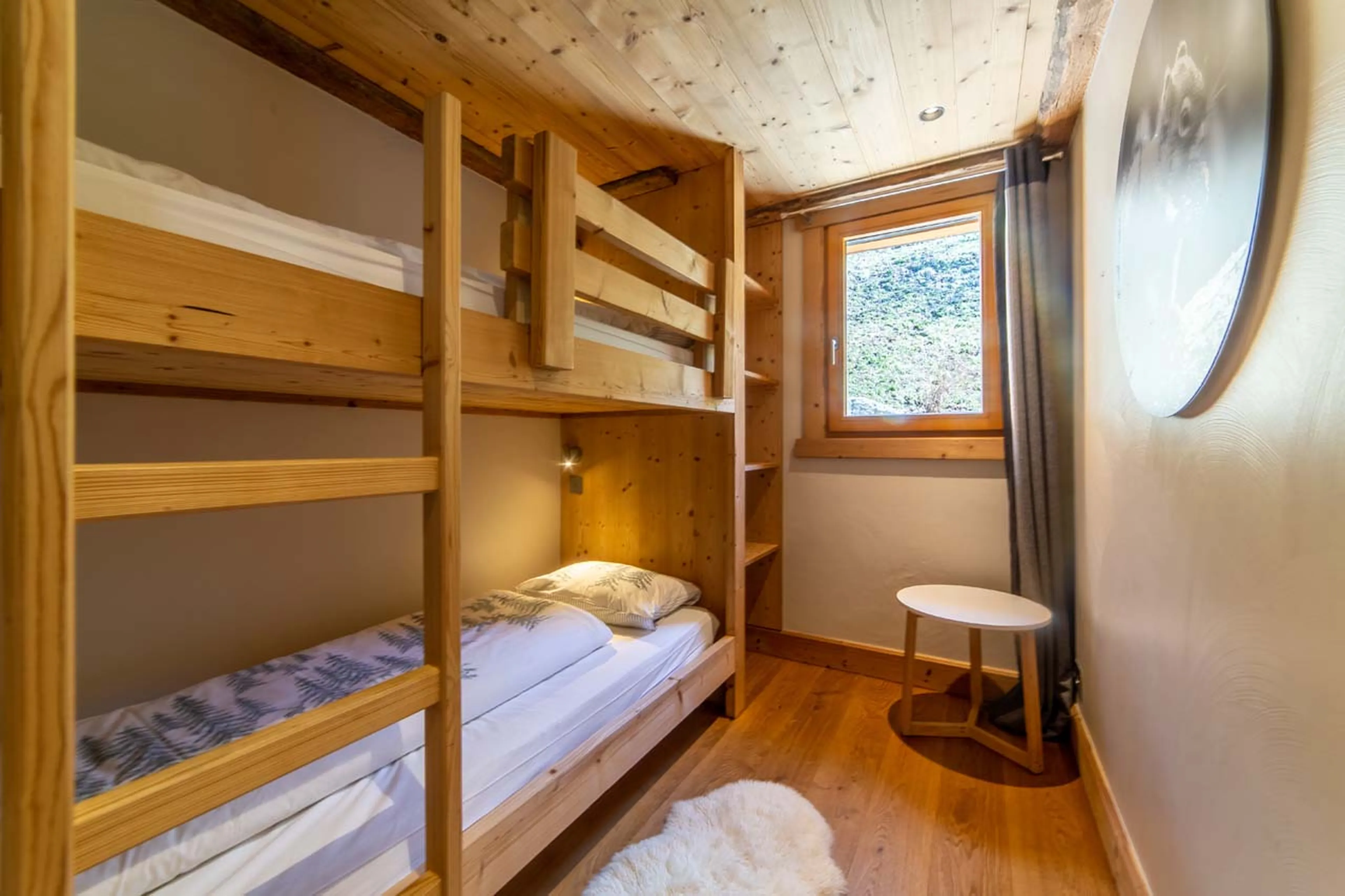 Bunk bed in family suite at La Ferme de Mon Grand Pere in Meribel