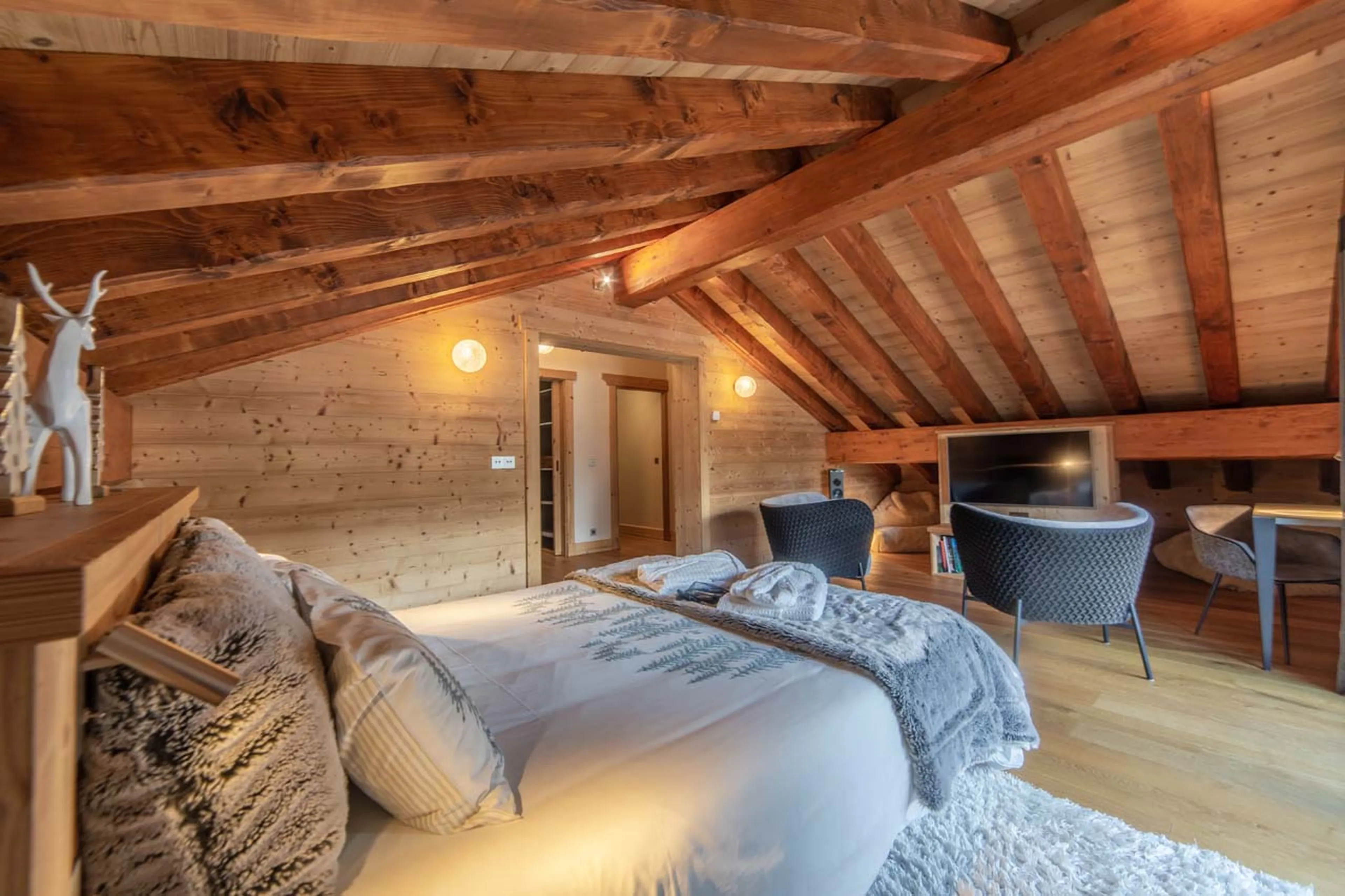 Bedroom one king-size bed at La Ferme de Mon Grand Pere in Meribel