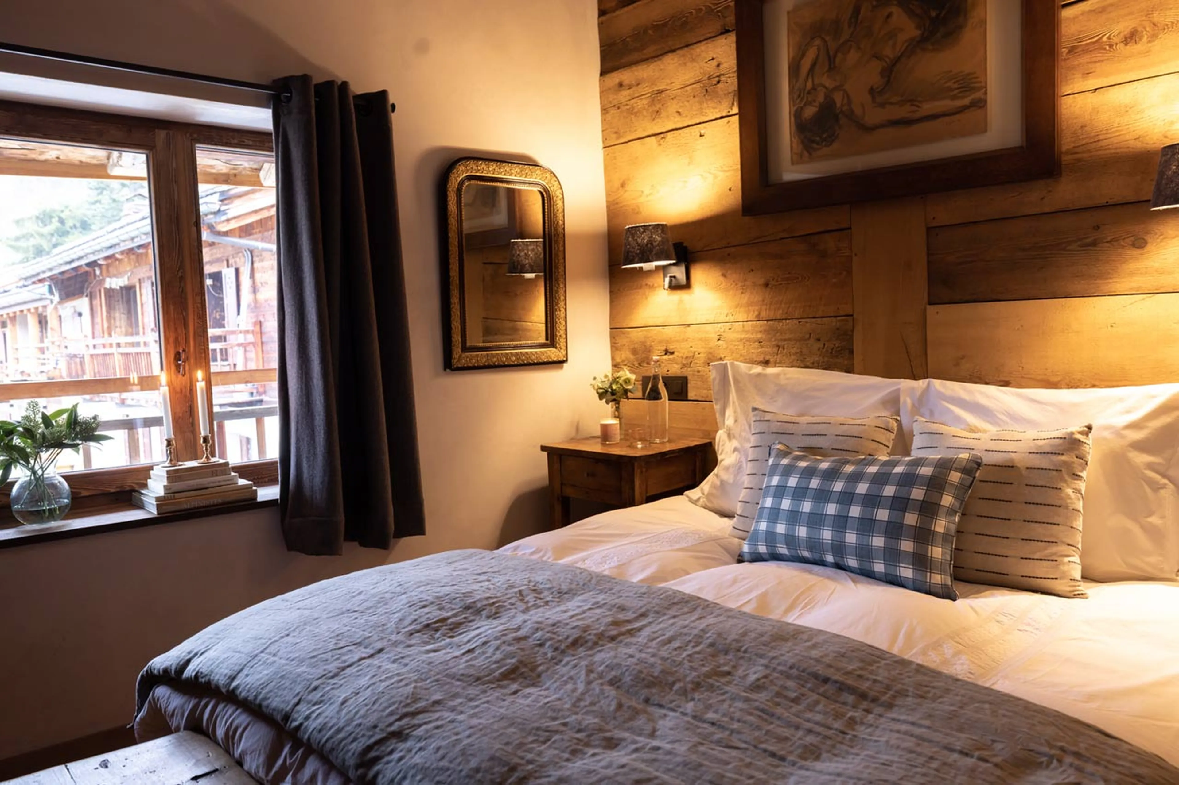 Double bedroom with window in La Ferme des Frasserands, Chamonix