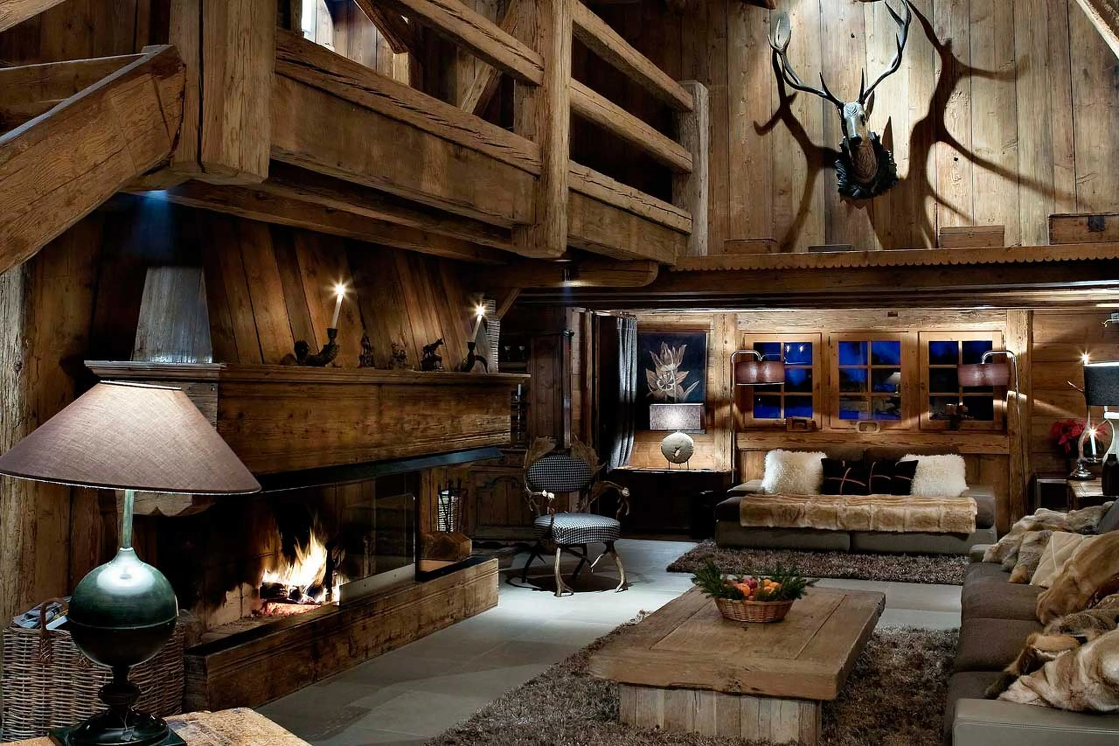 Living room at night of Chalet des Fermes in Megeve