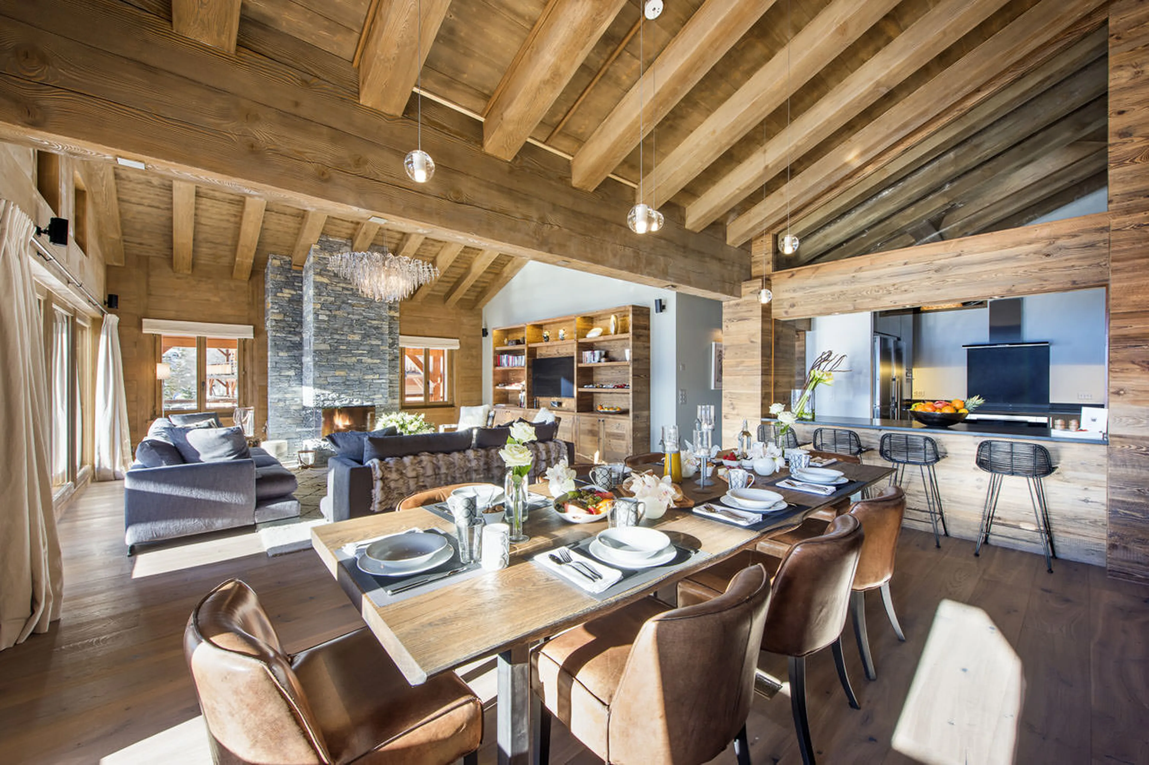 Natural light flooding through French windows in Le Daray Penthouse in Verbier