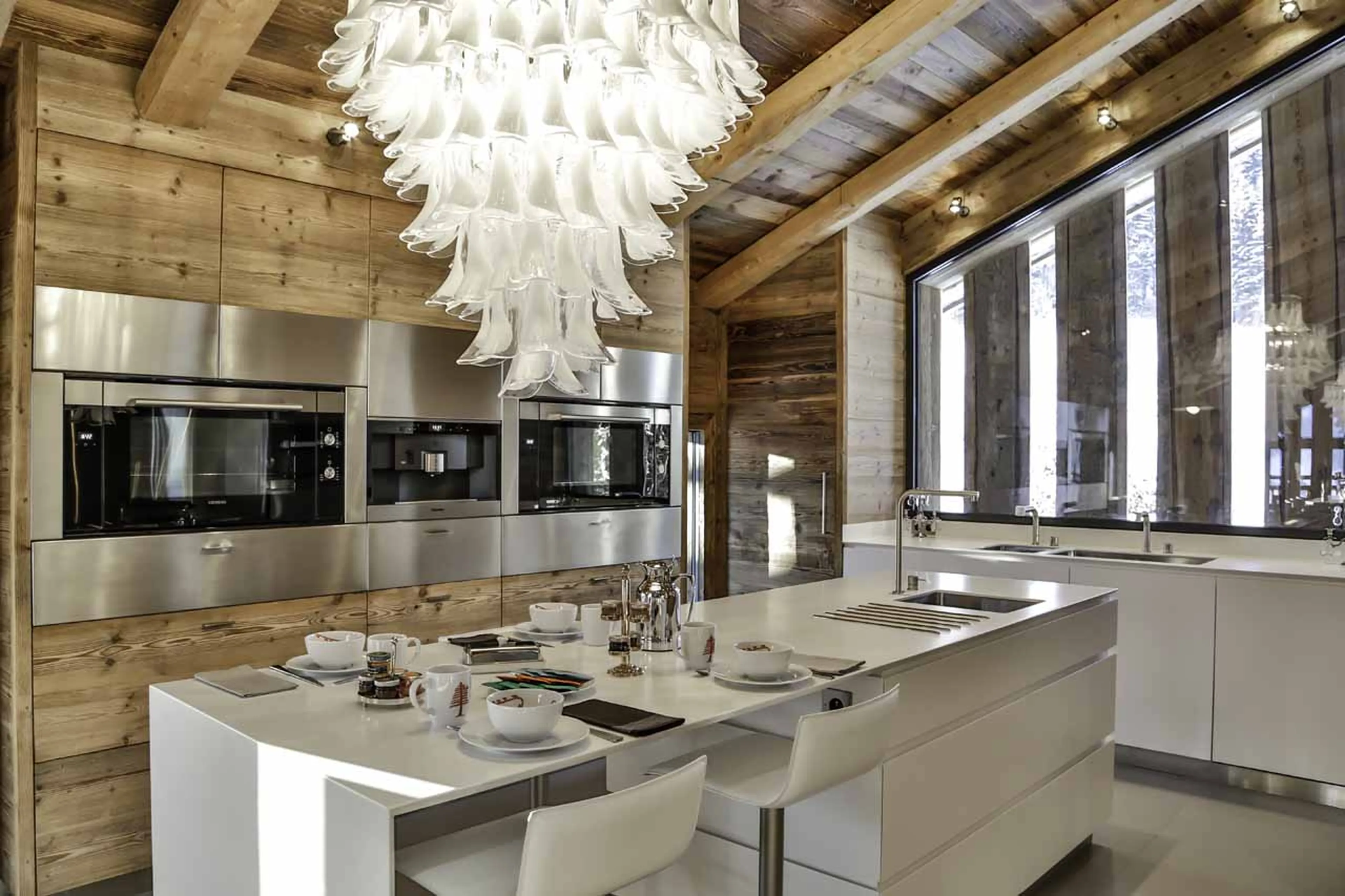 Bar seating at kitchen island at La Fermes a la Leonthine in Megeve