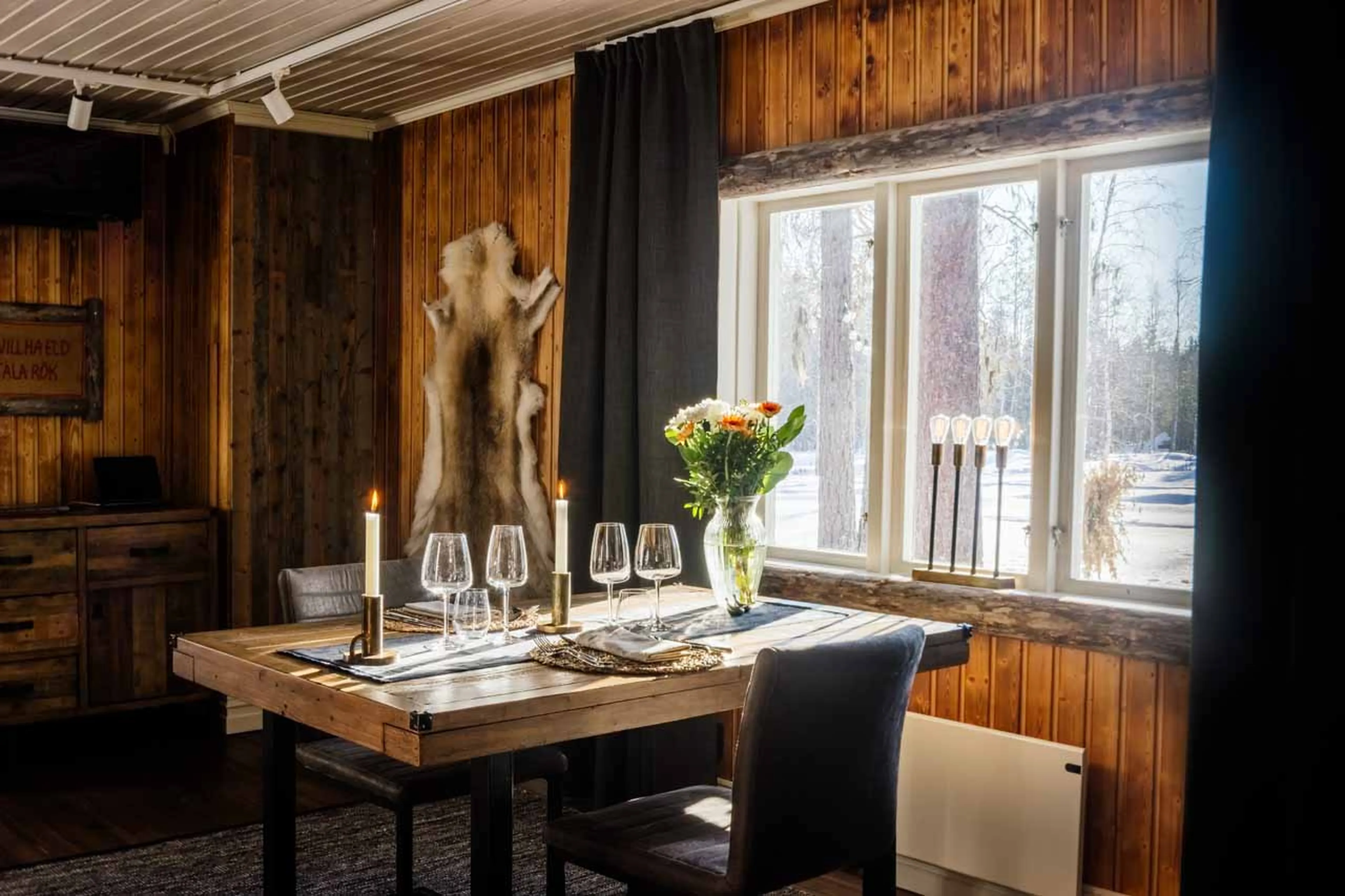 Chairs and dining table at Logger's Lodge in Sweden