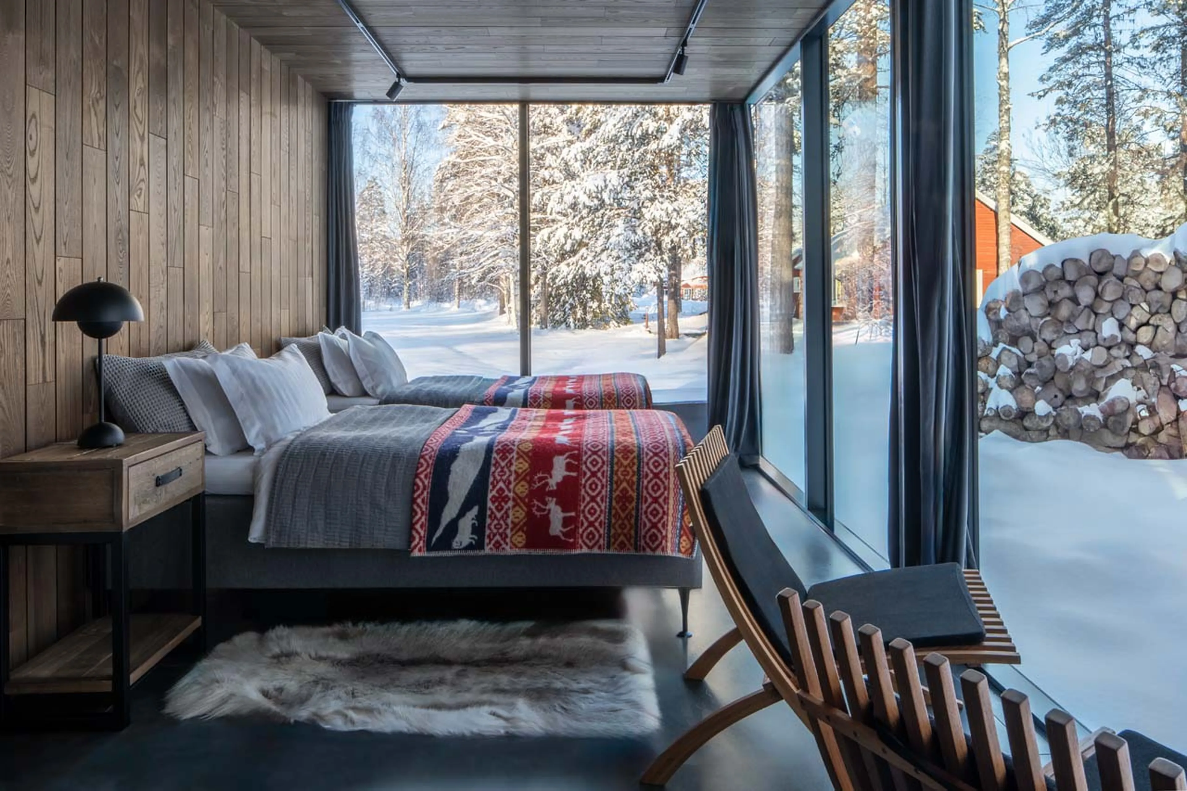 Bedroom in glass pod at Logger's Lodge in Sweden