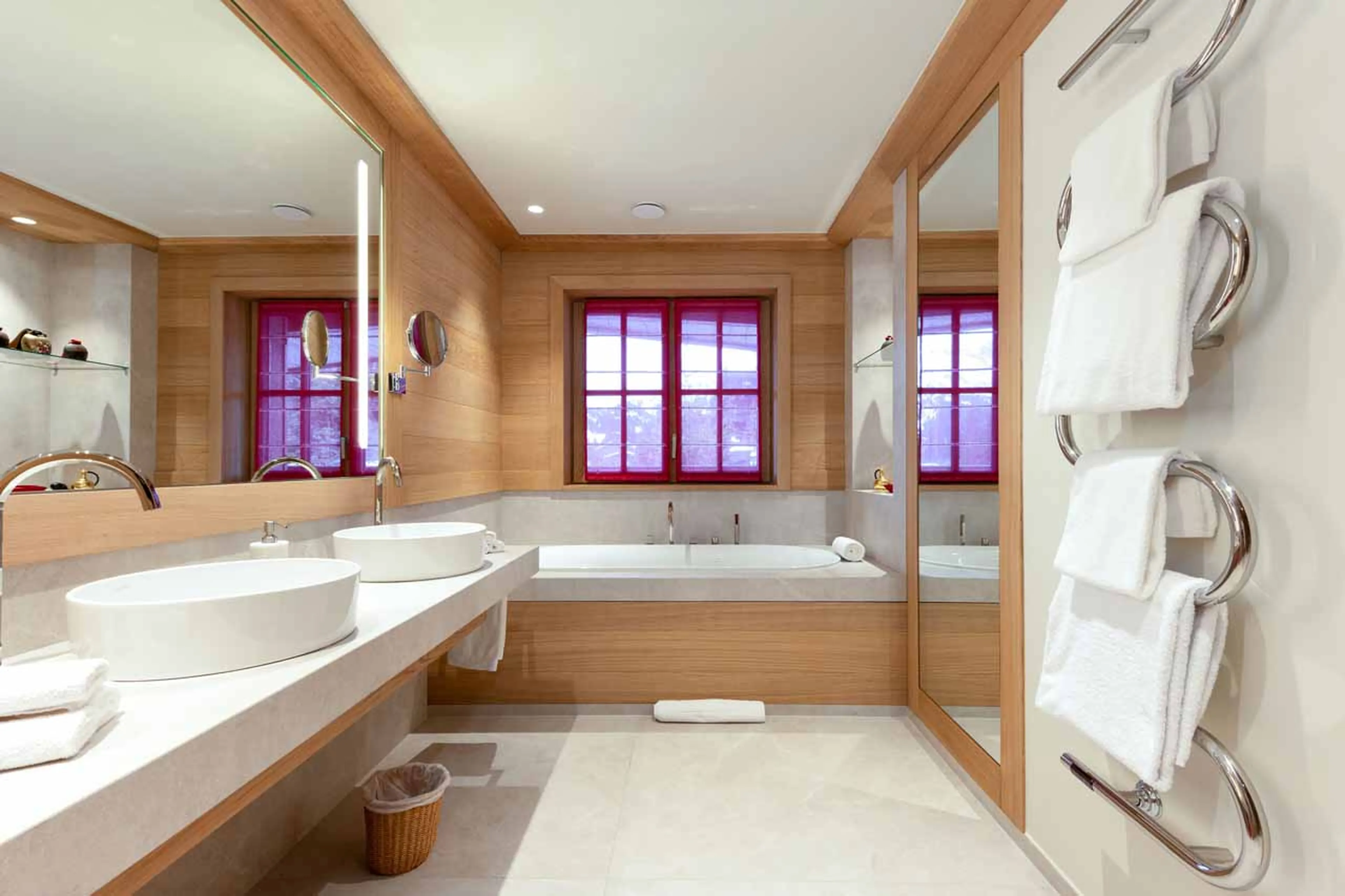 En-suite bathroom with separate shower and twin sinks in Lord of Snow, Courchevel 1850