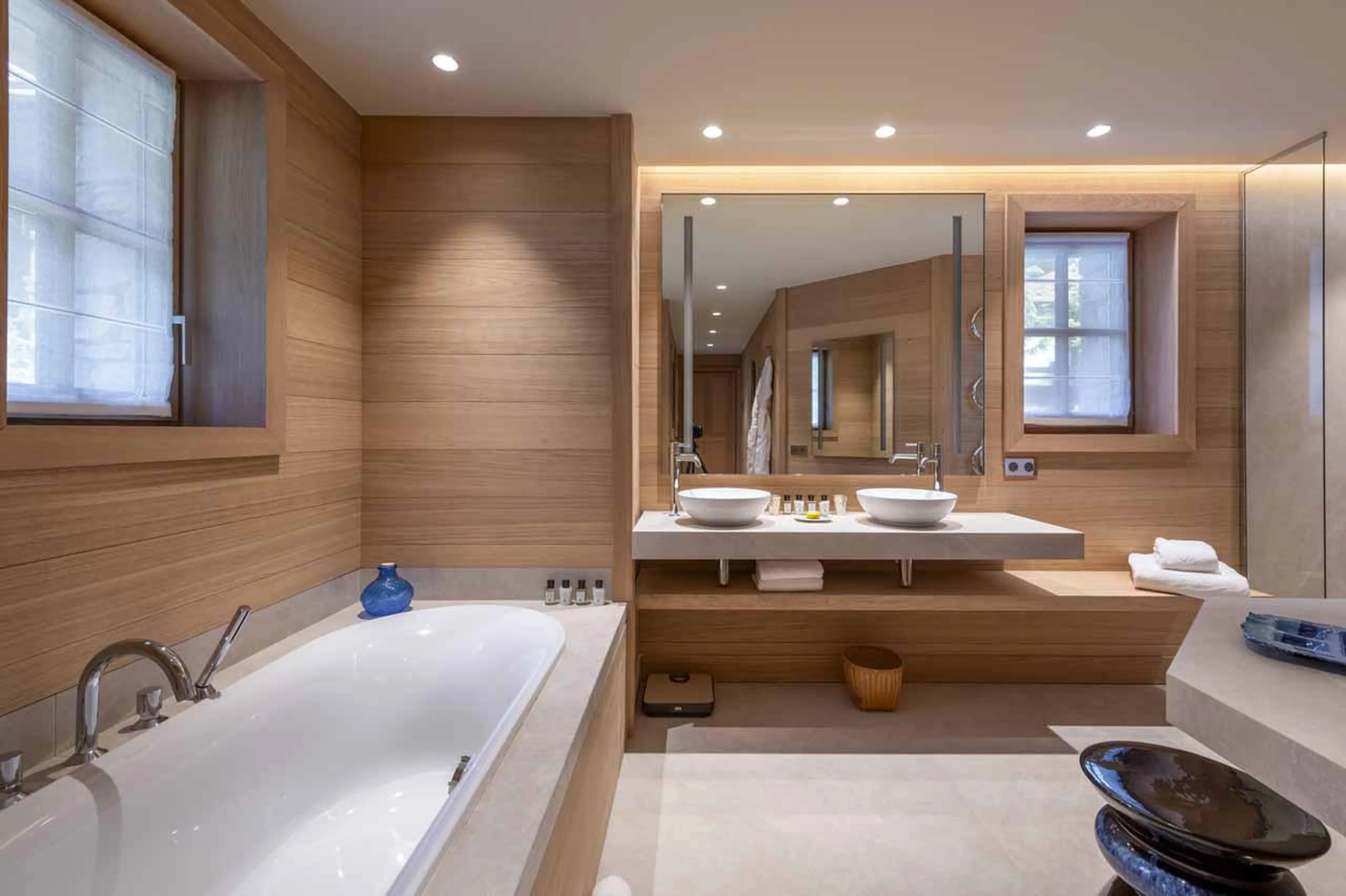 En-suite bathroom with separate shower and twin sinks in Lord of Snow, Courchevel 1850