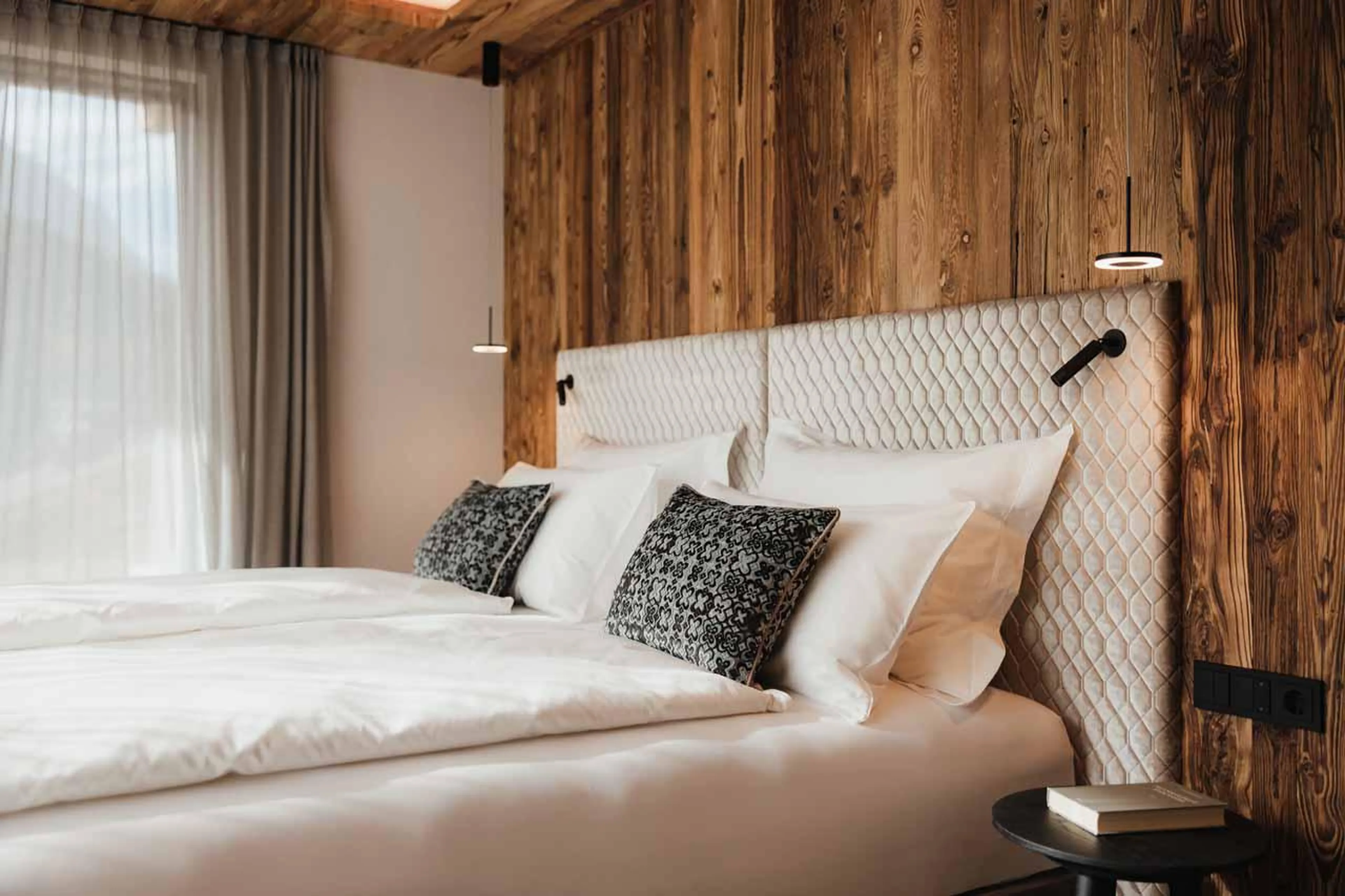 Bedroom one double at Chalet Lum d'Or in Val Gardena