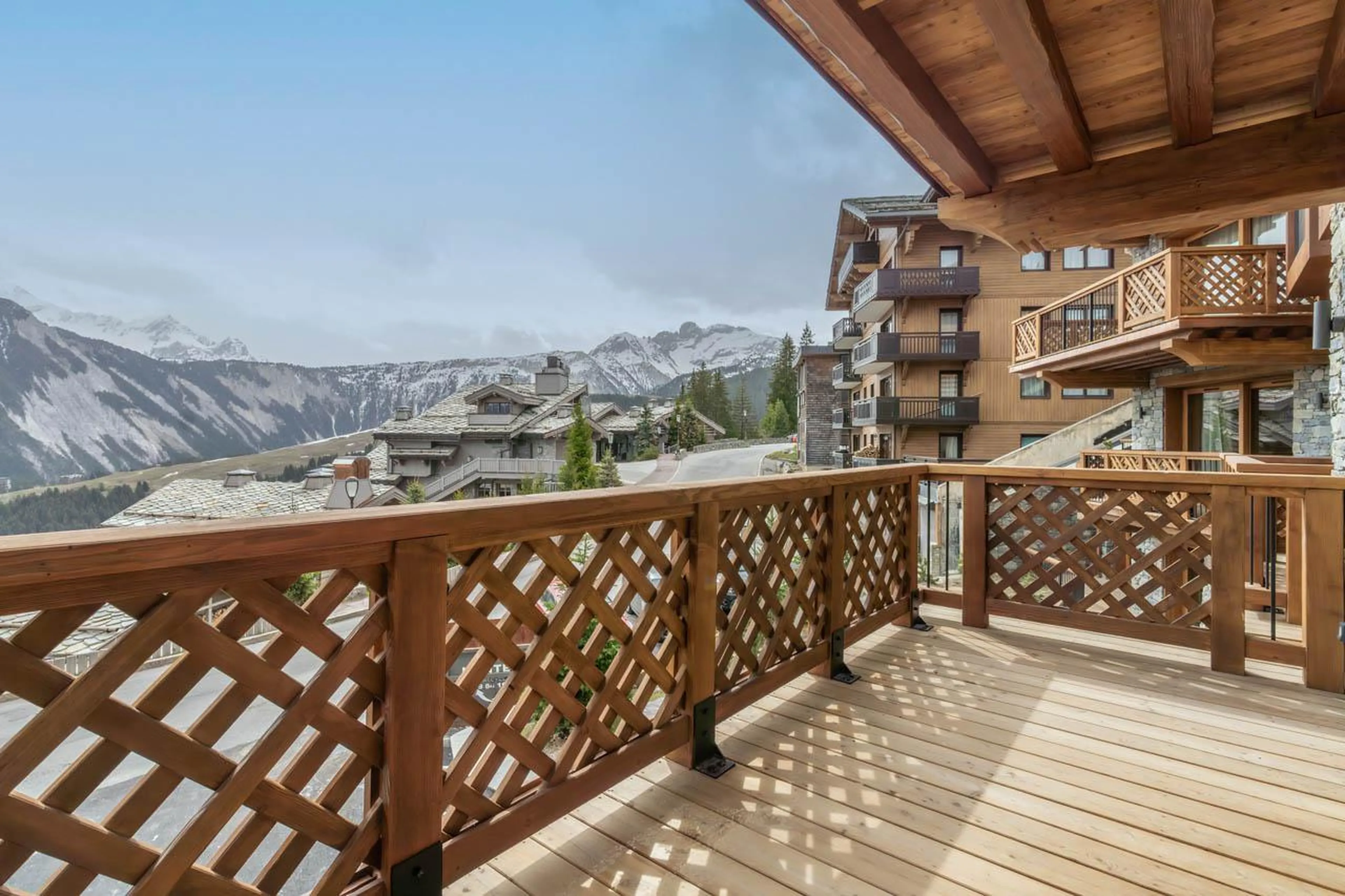 Generous balcony with unobstructed mountain views at Apartment Manej 4 in Courchevel 1850