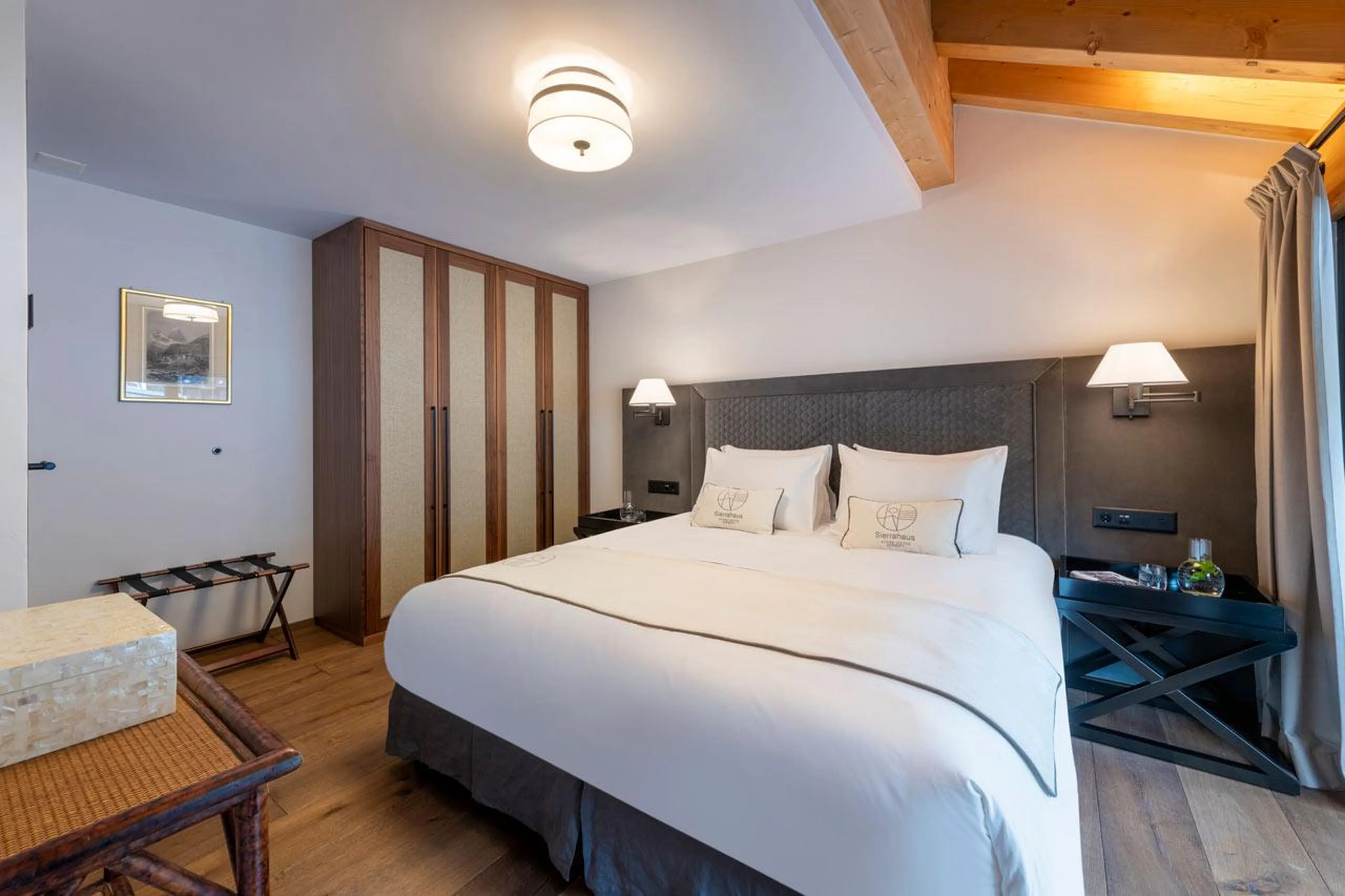 Bed in bedroom four in Matterhorn Penthouse, Zermatt