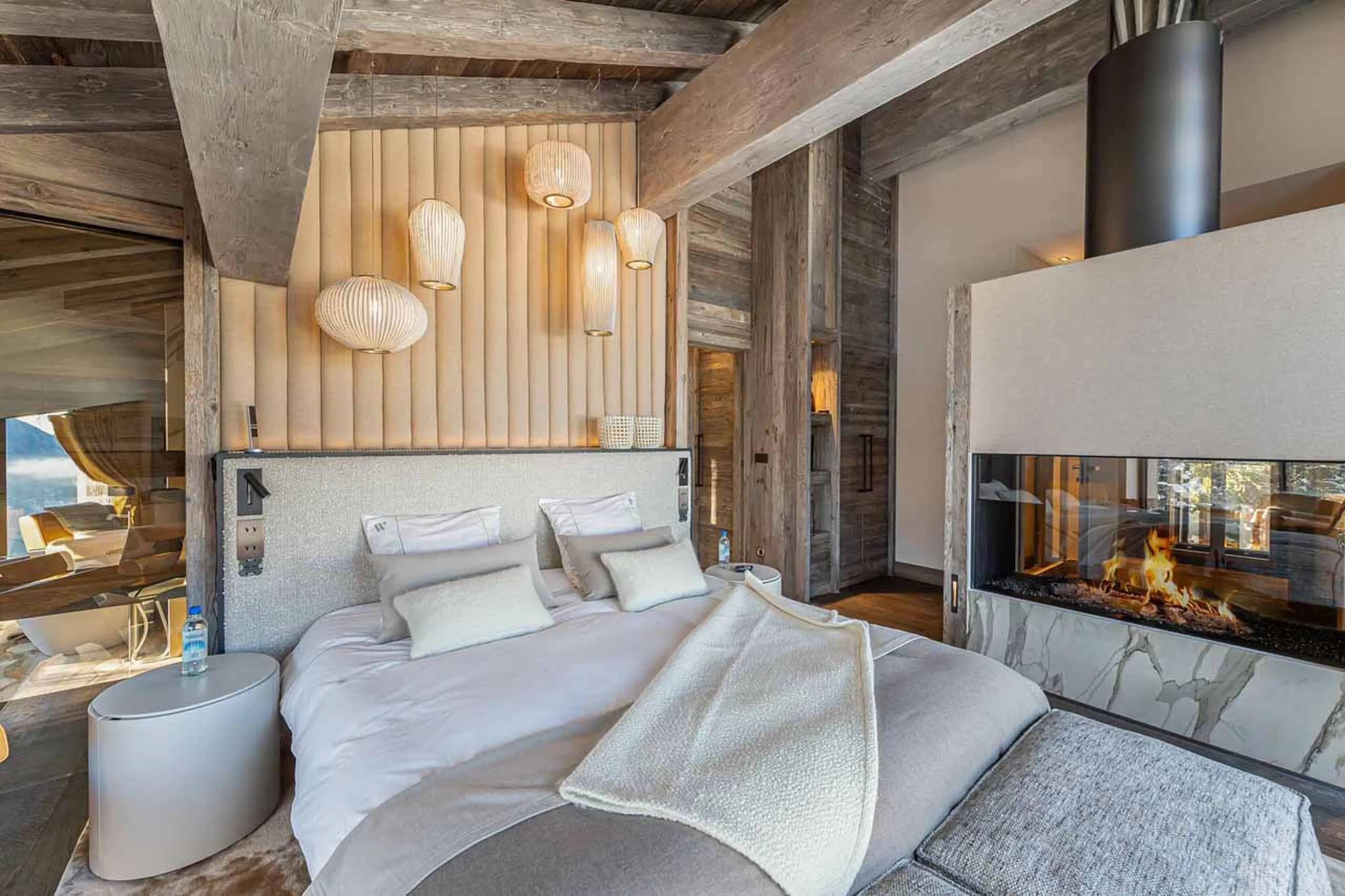 Fireplace in master suite at Chalet White Sand in Courchevel 1550