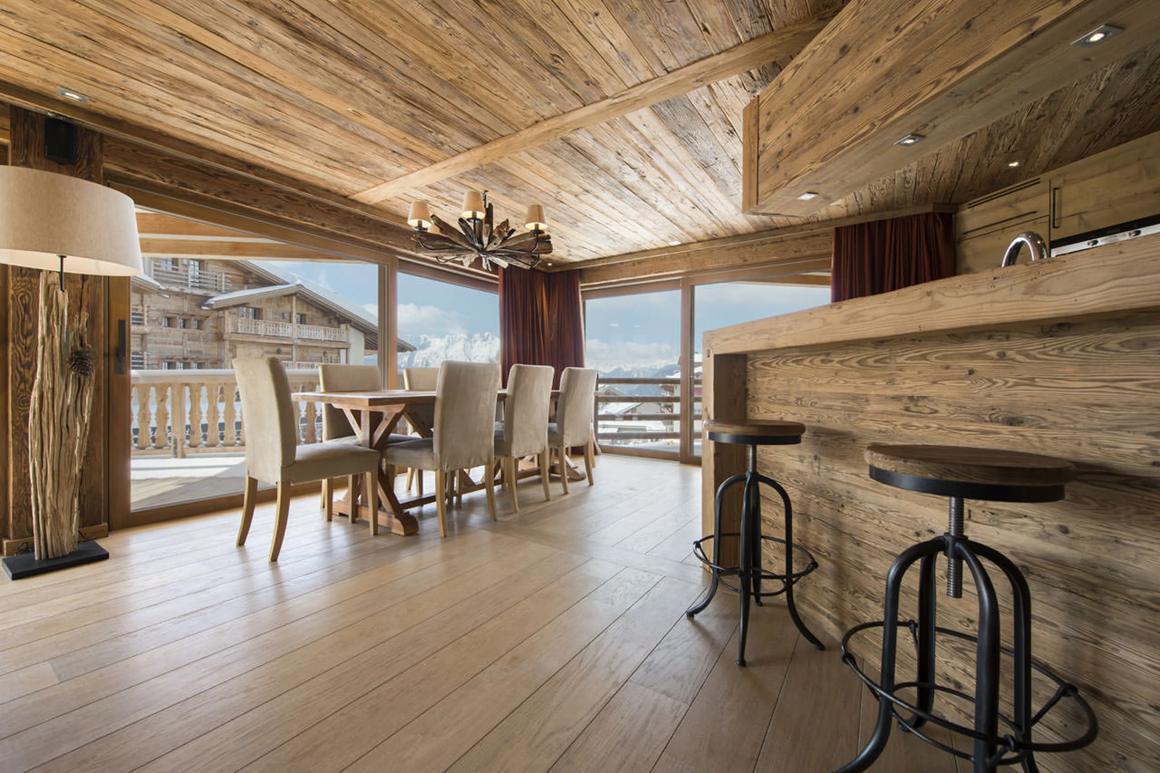 Dining table and kitchen bar at Exterior of No. 5 Apartment 4 in Verbier