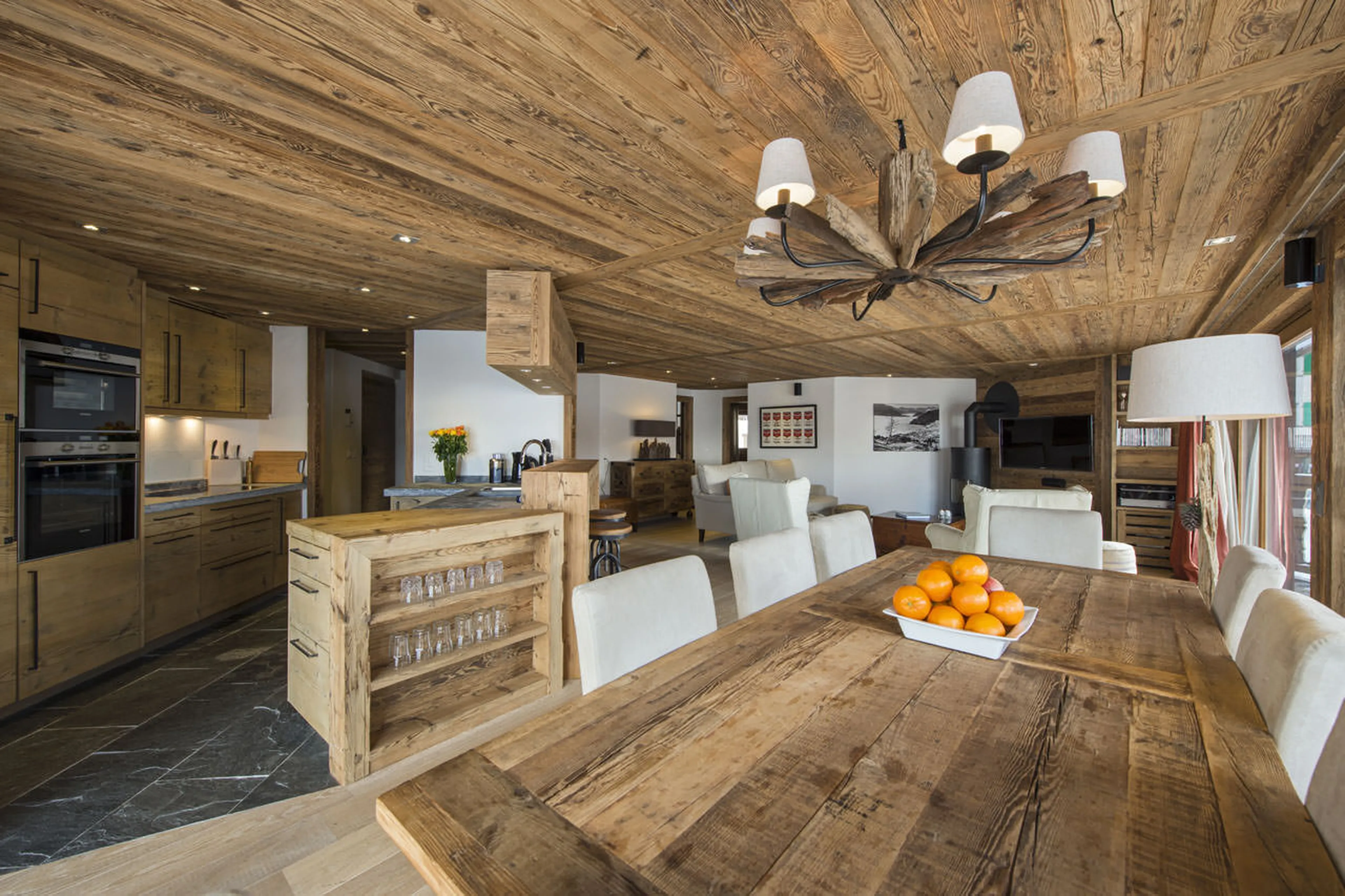 Dining table and kitchen at Exterior of No. 5 Apartment 4 in Verbier