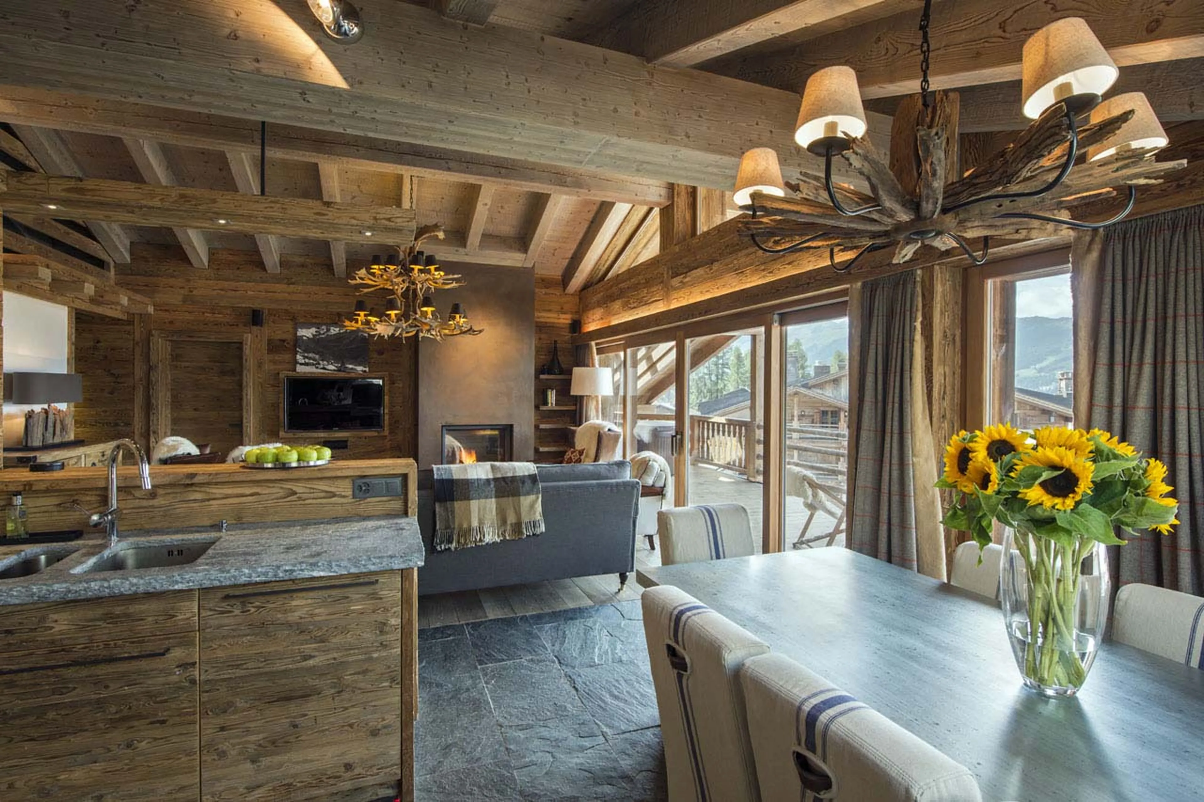 Dining area and kitchen in No. 5 Penthouse in Verbier