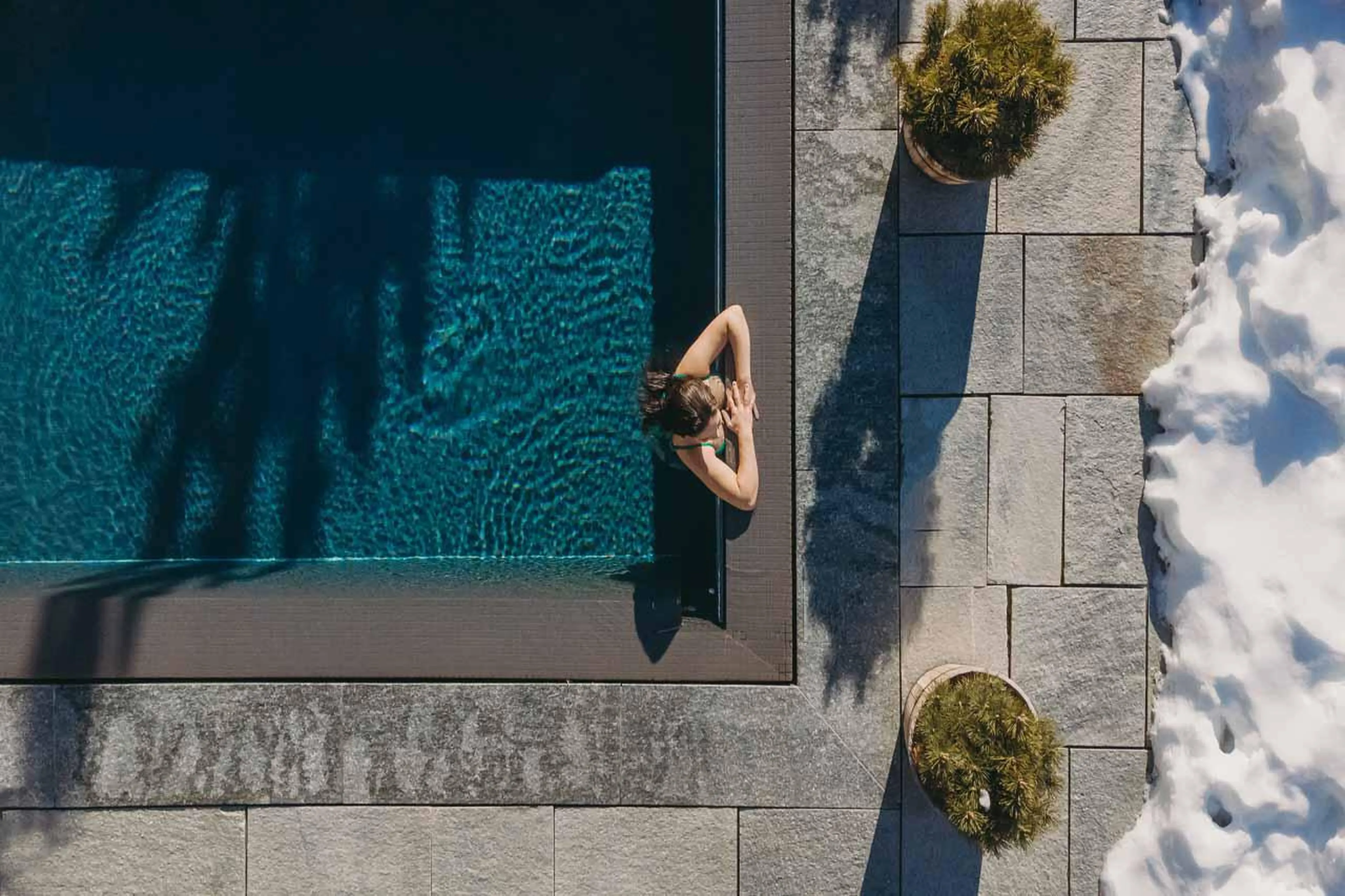 Outdoor swimming pool in Prestige Apartment LeCrans