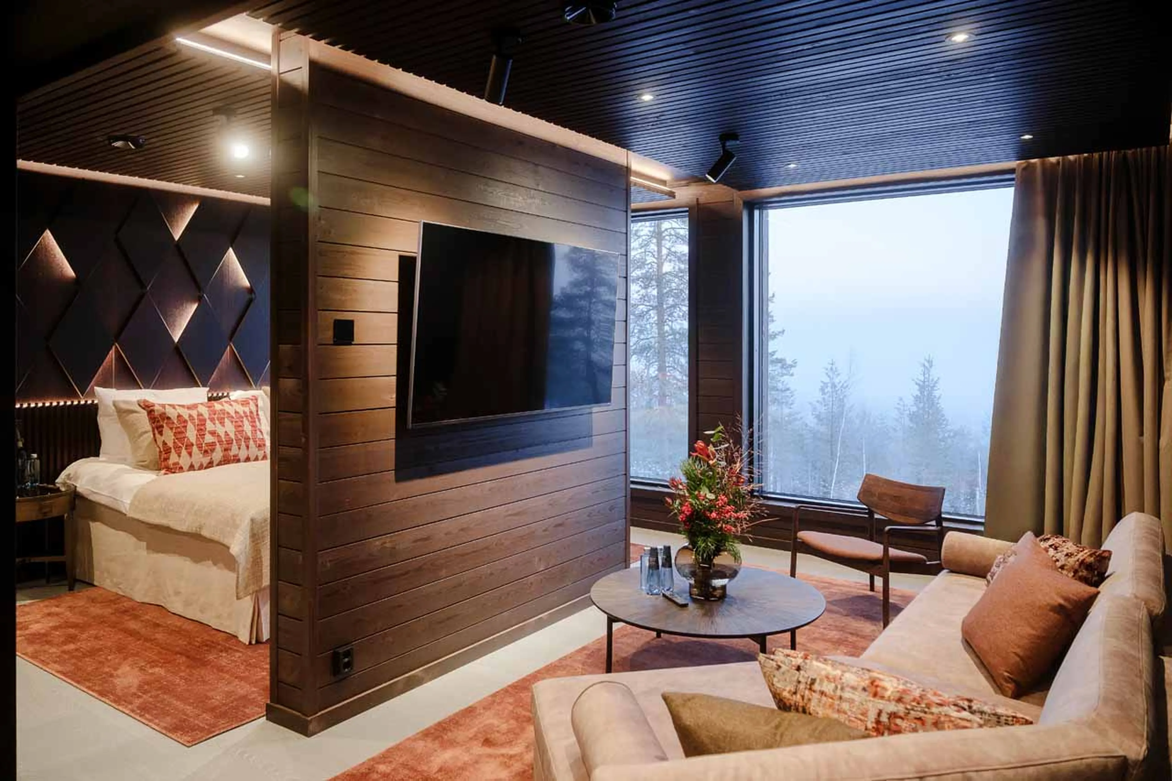 Bedroom 1 living area at Octola II Lodge in Finland