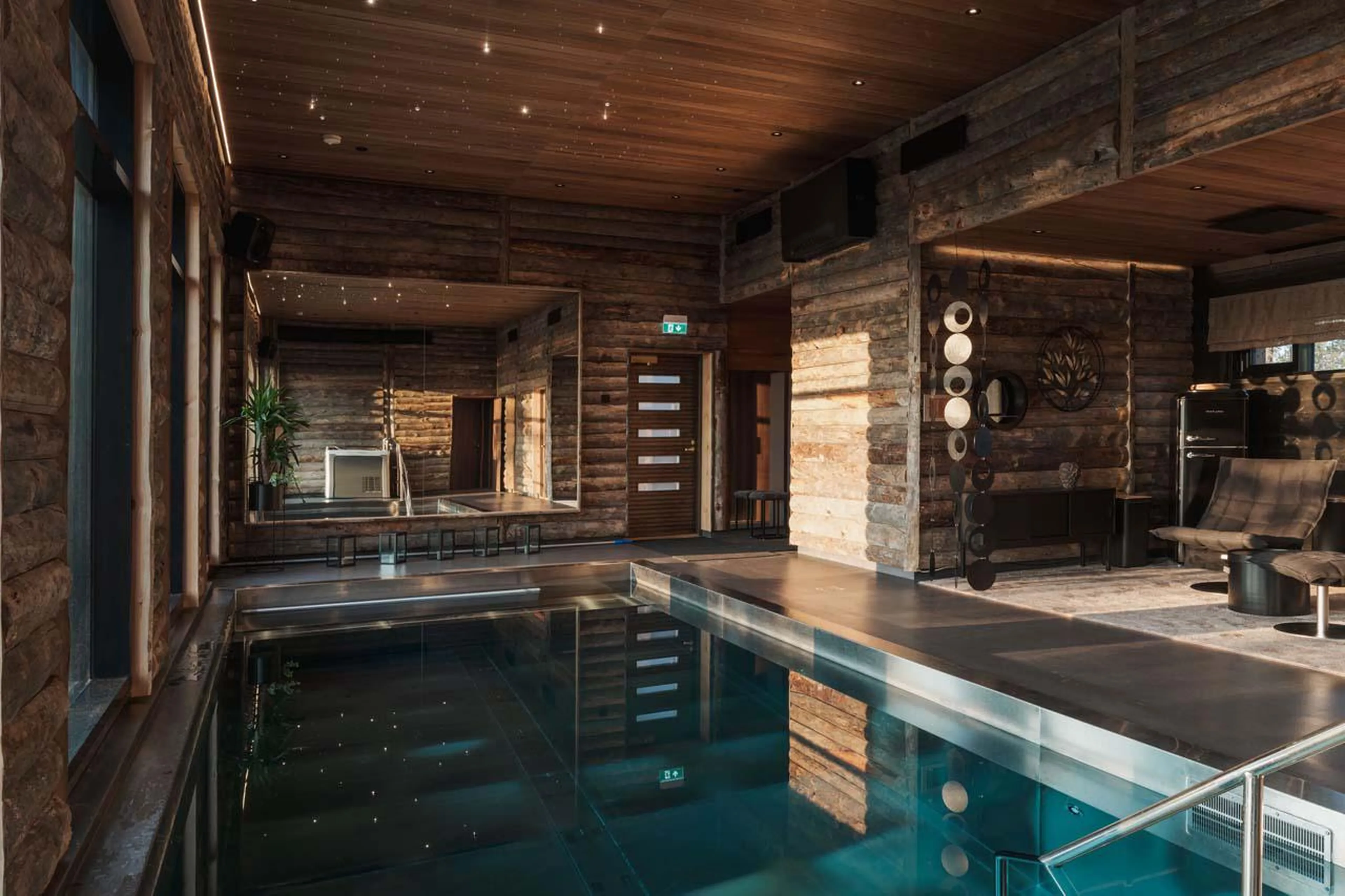 Shared spa with swimming pool, sauna and relaxation room at Octola Glass Igloo in Finland