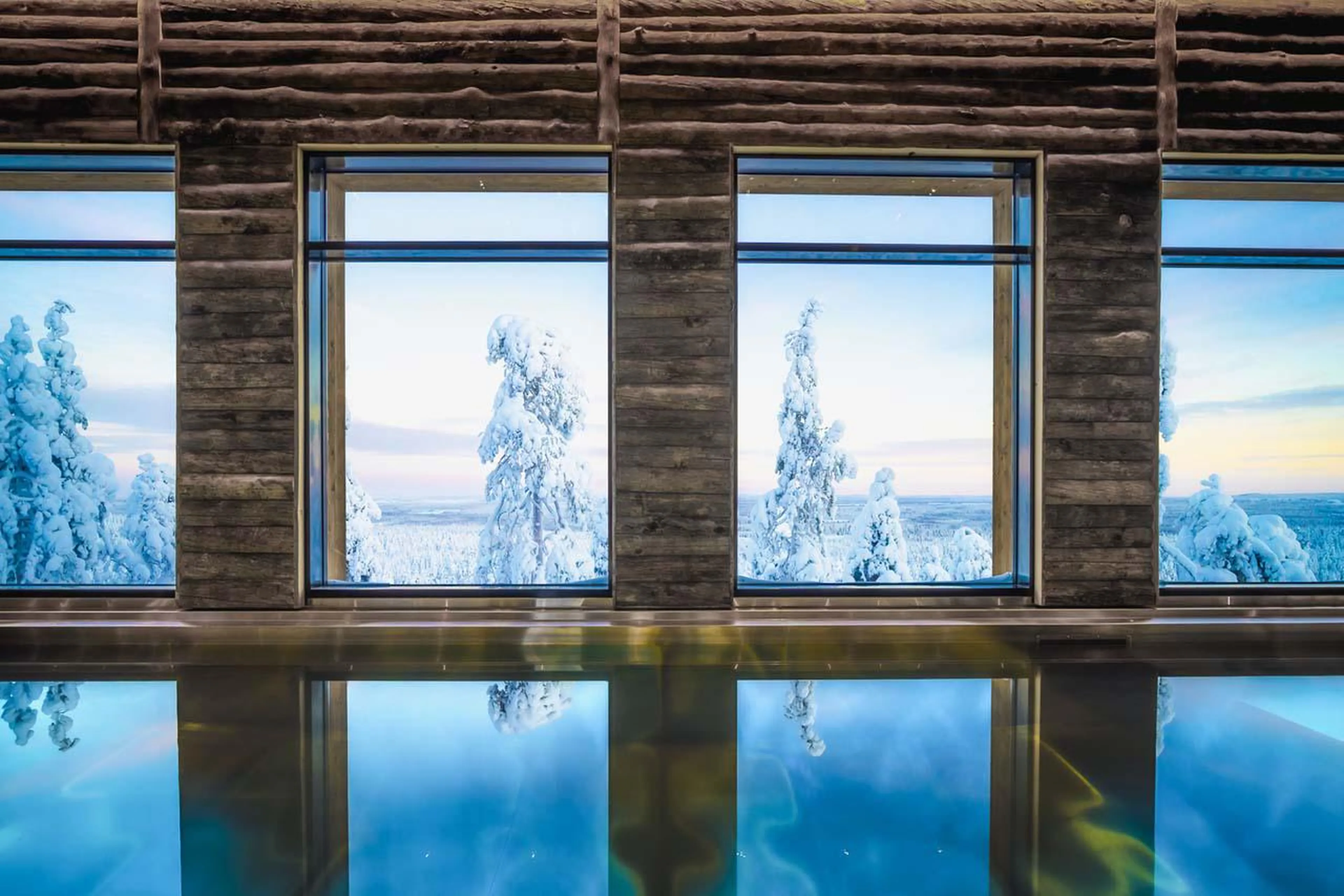Beautiful winter views from the swimming pool at Octola Glass Igloo in Finland