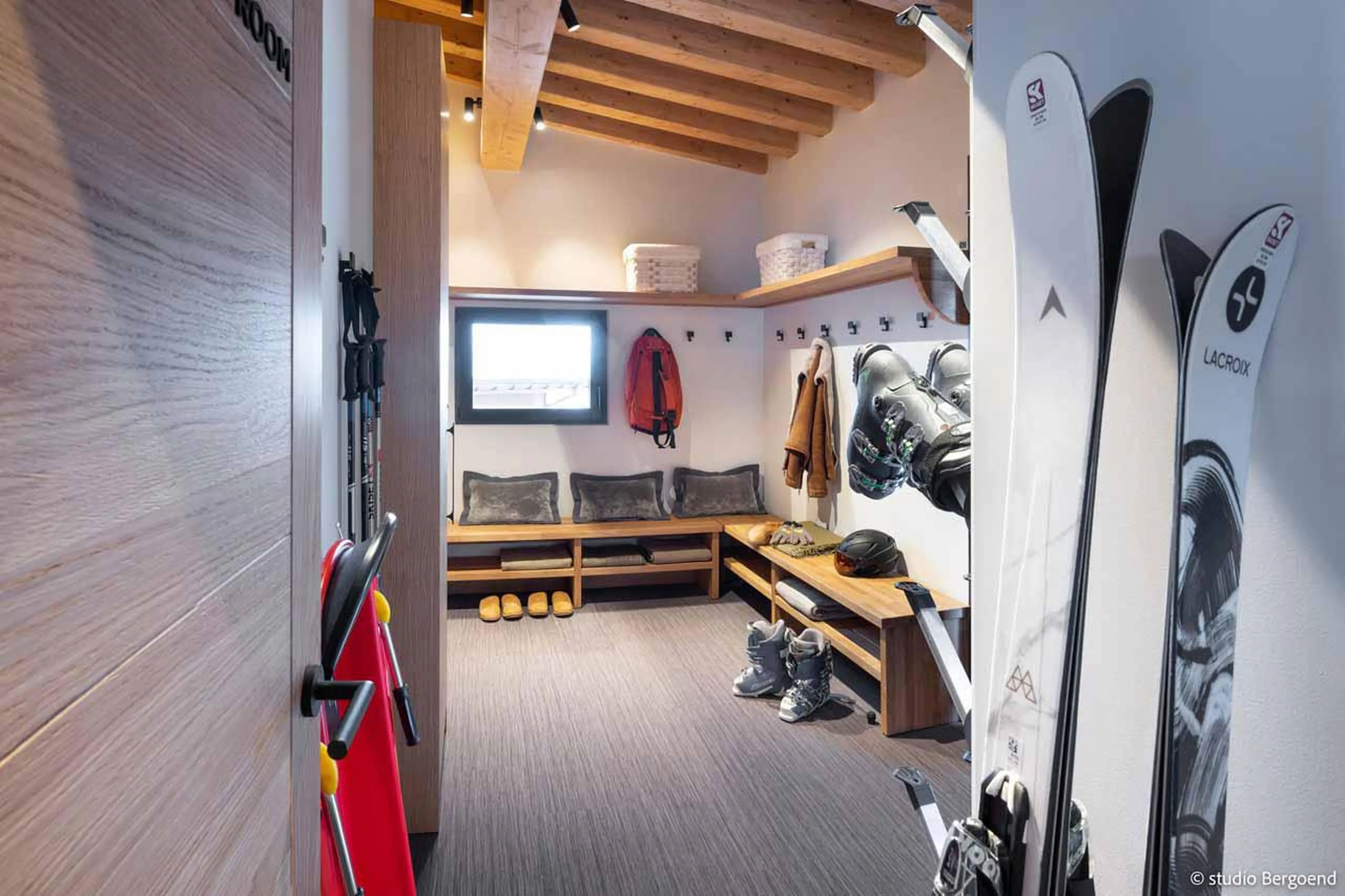 Ski room with heated racks and sledge at Chalet Arpoza in Les Arcs