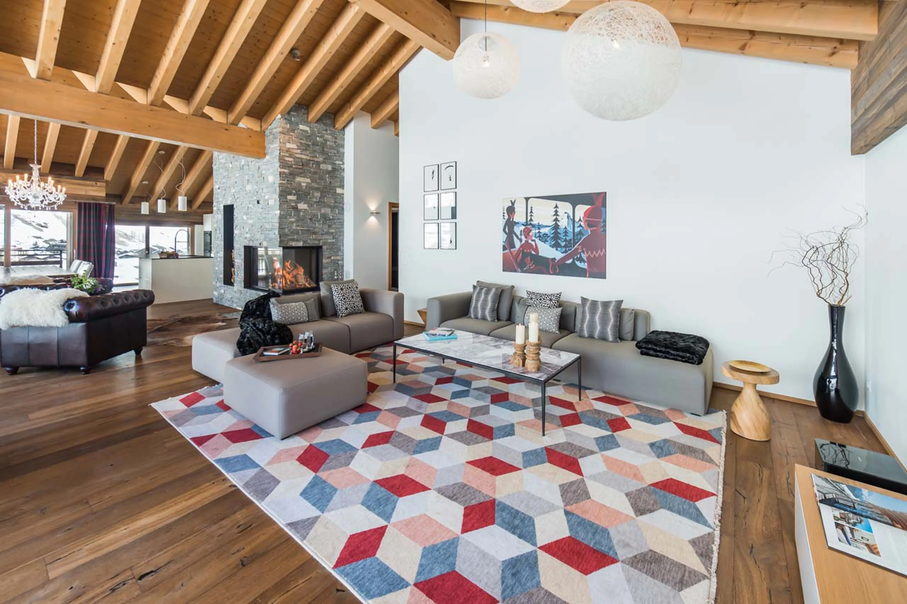 Spacious seating area in living room of Penthouse Aria in Zermatt