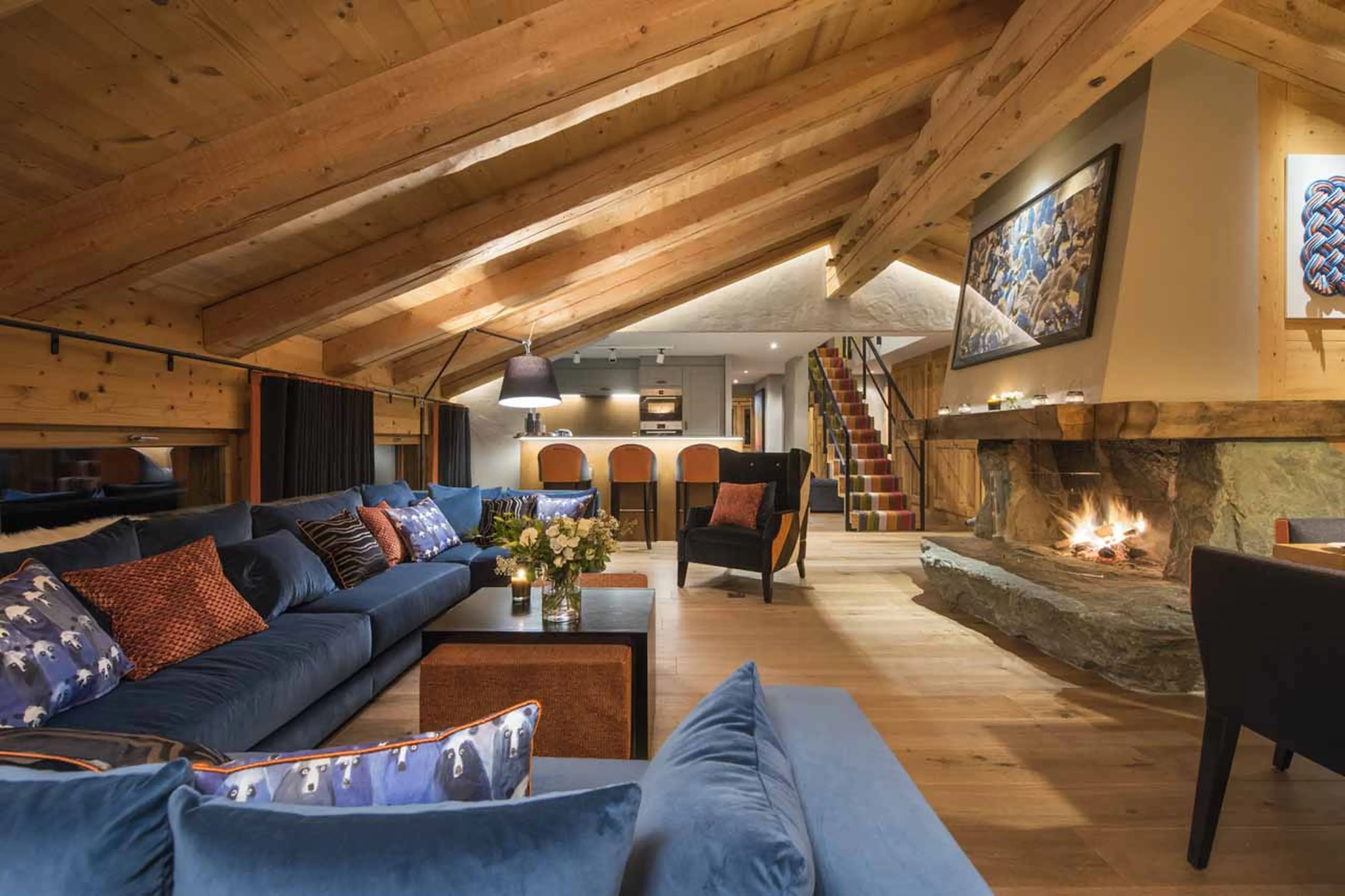 Stone fireplace at Penthouse Entre Ciel et Terre in Verbier