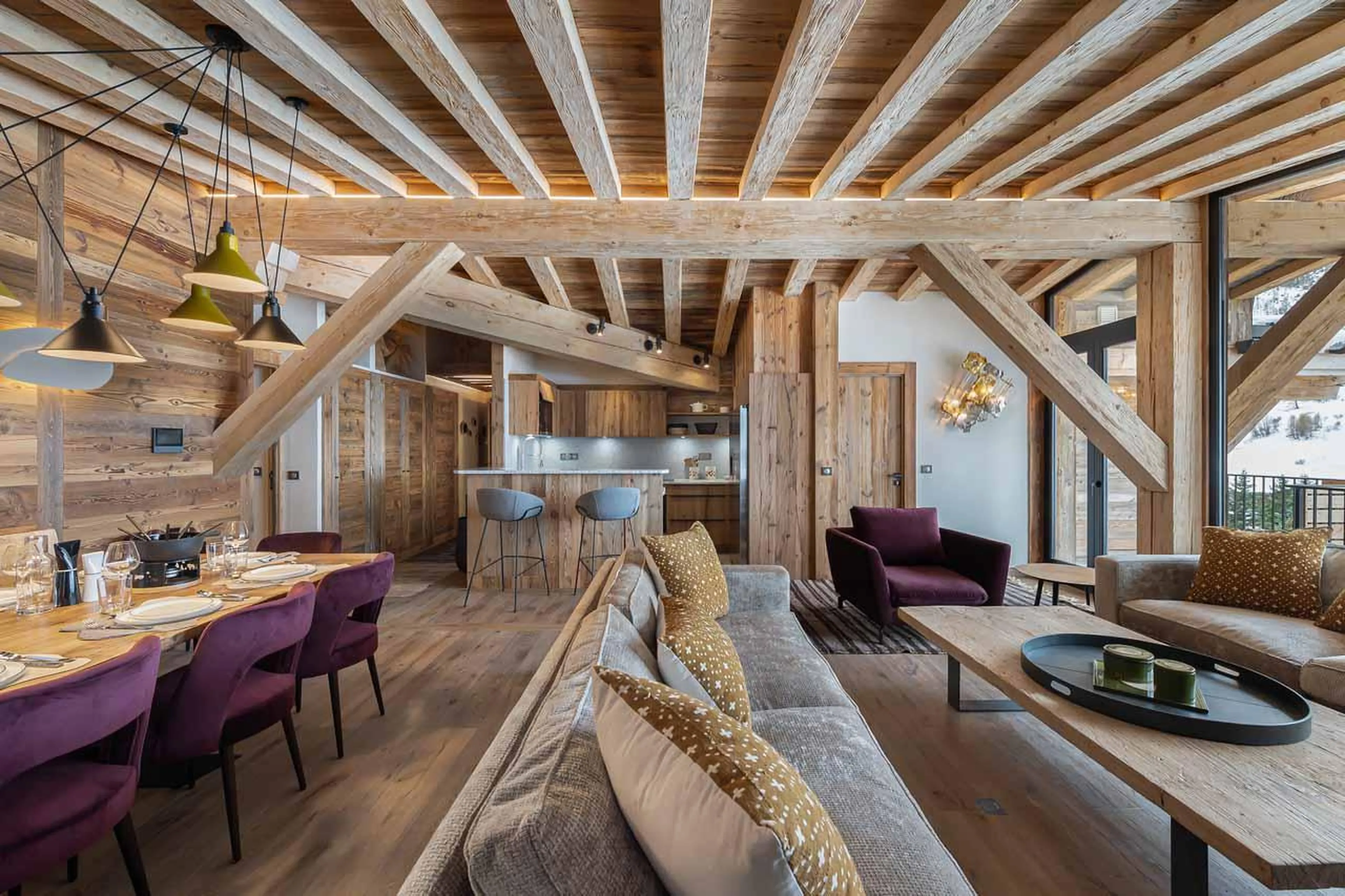 Open-plan living, kitchen and dining area in Penthouse Fleche, Val d'Isere