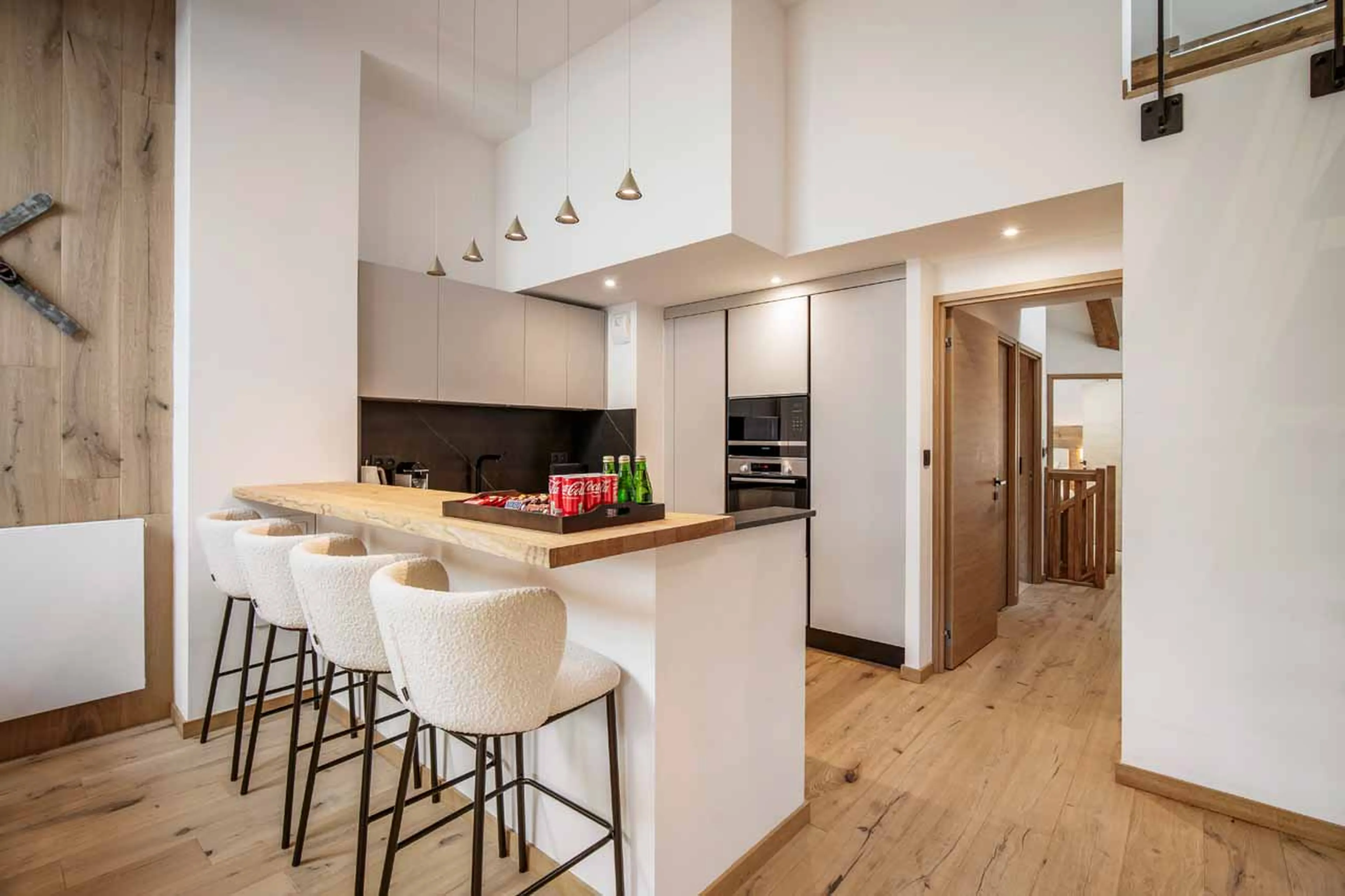 Kitchen bar seating at Penthouse Nebula in Courchevel 1650