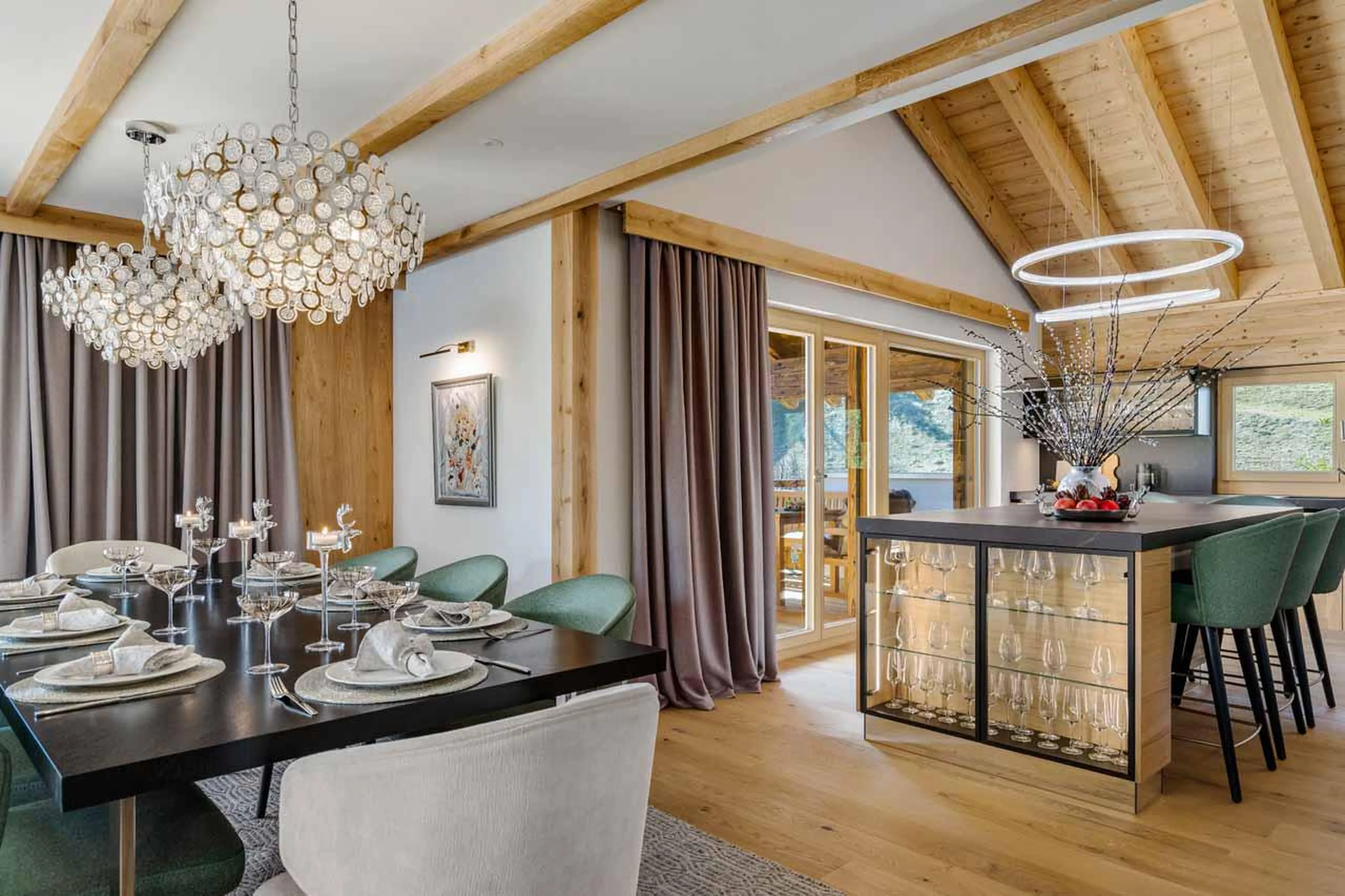 Dining area and kitchen at Penthouse Silvretta in Klosters