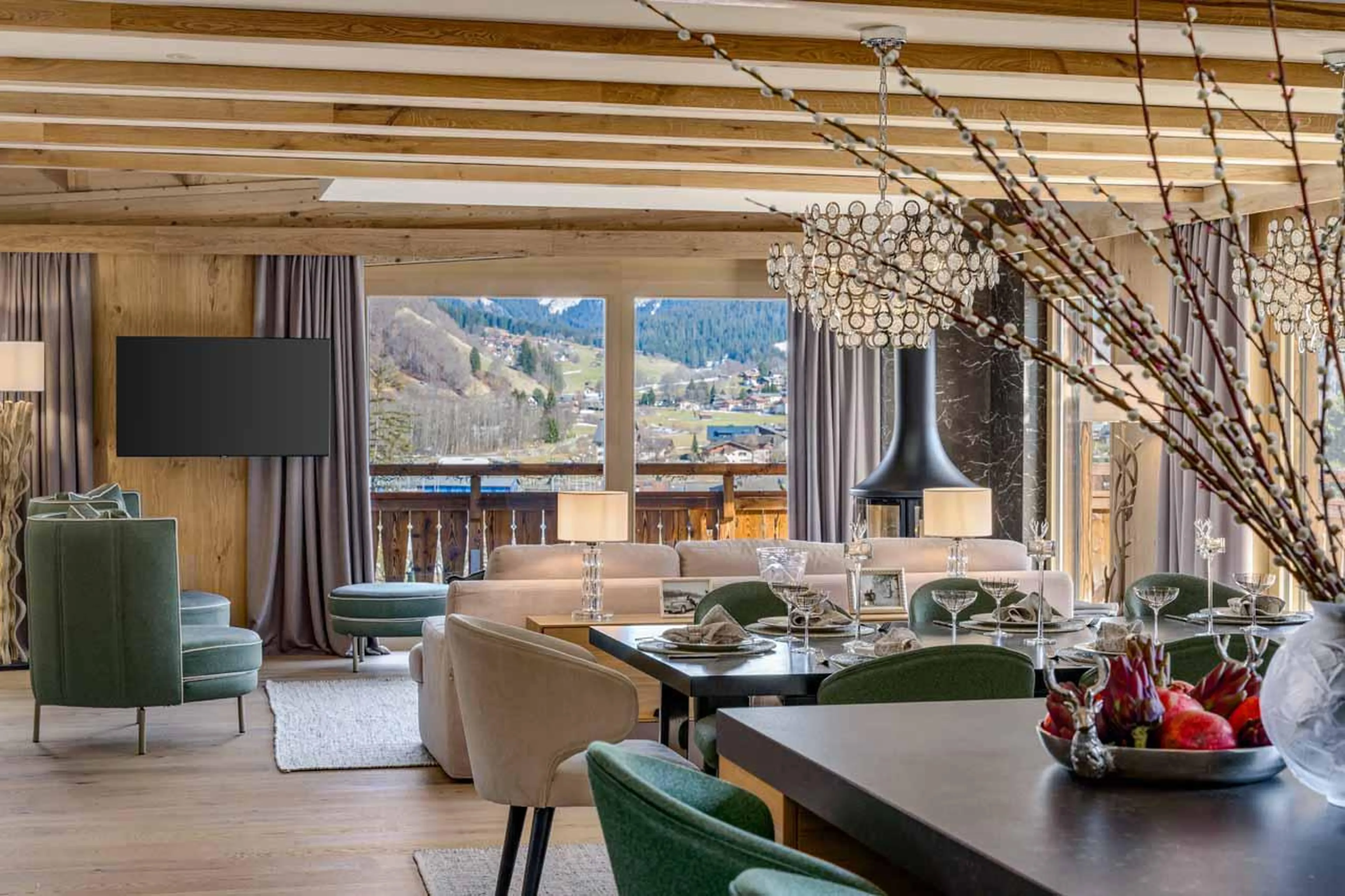 Open-plan living and dining area at Penthouse Silvretta in Klosters